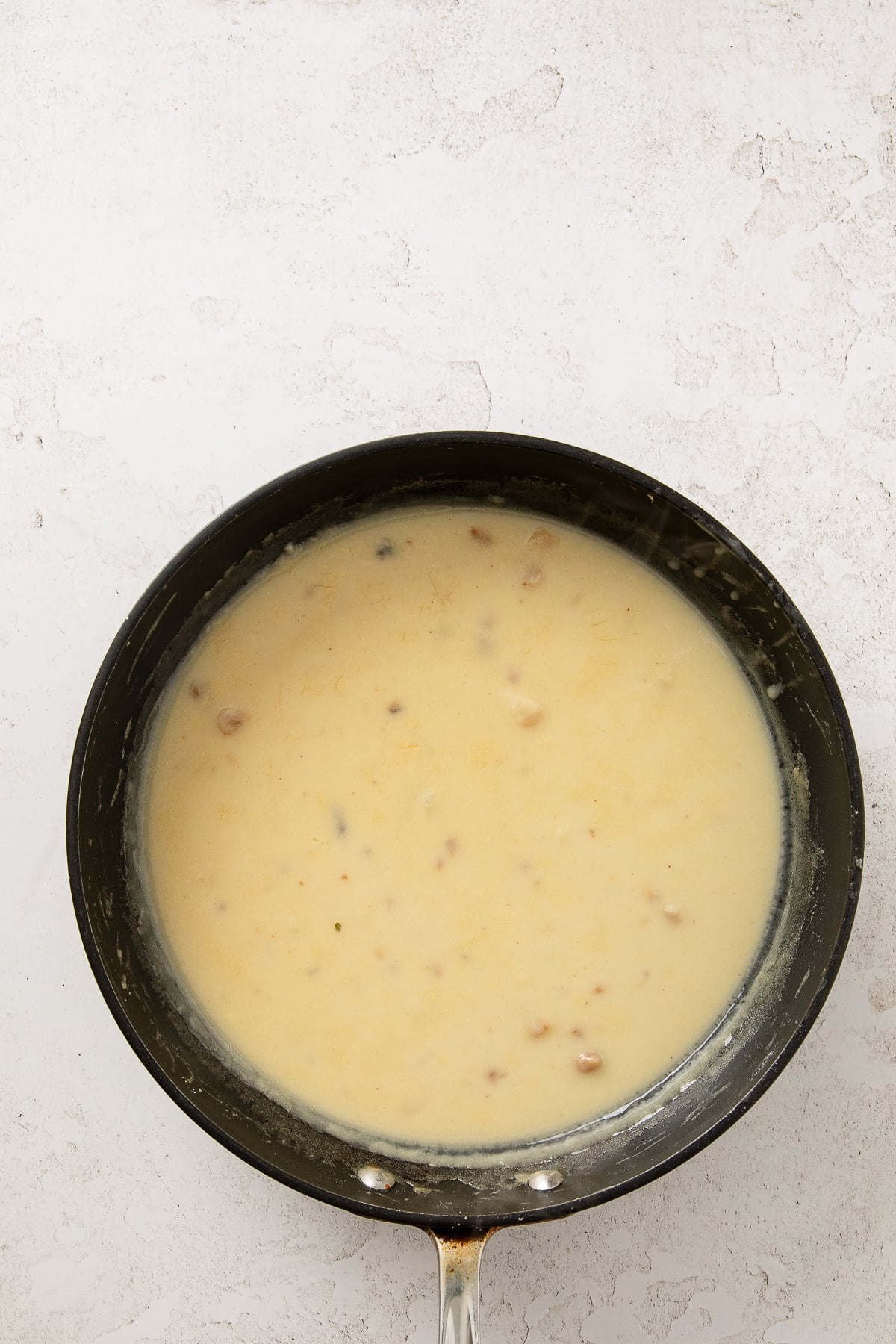 Broth and cream added to the skillet to make a gravy.