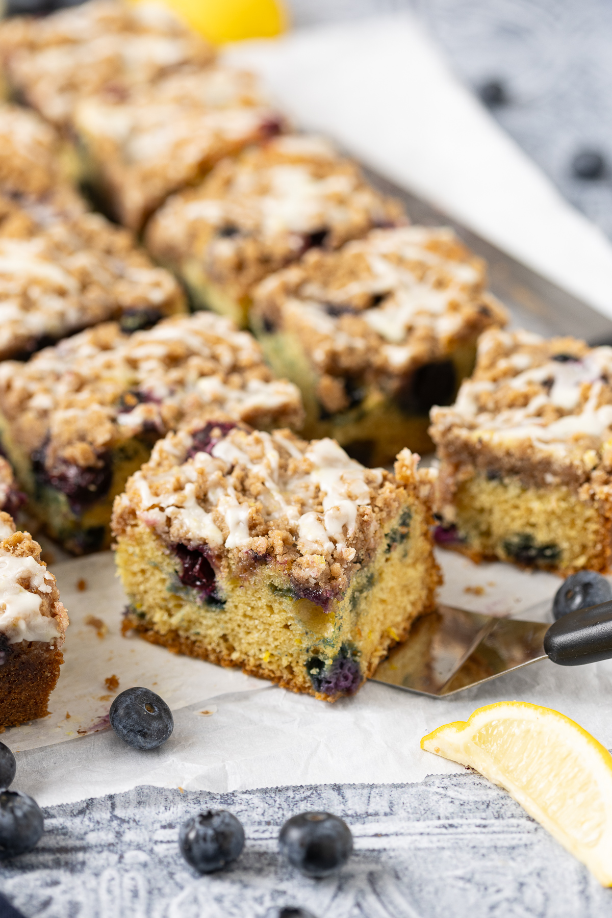 A piece of coffee cake with being picked up.