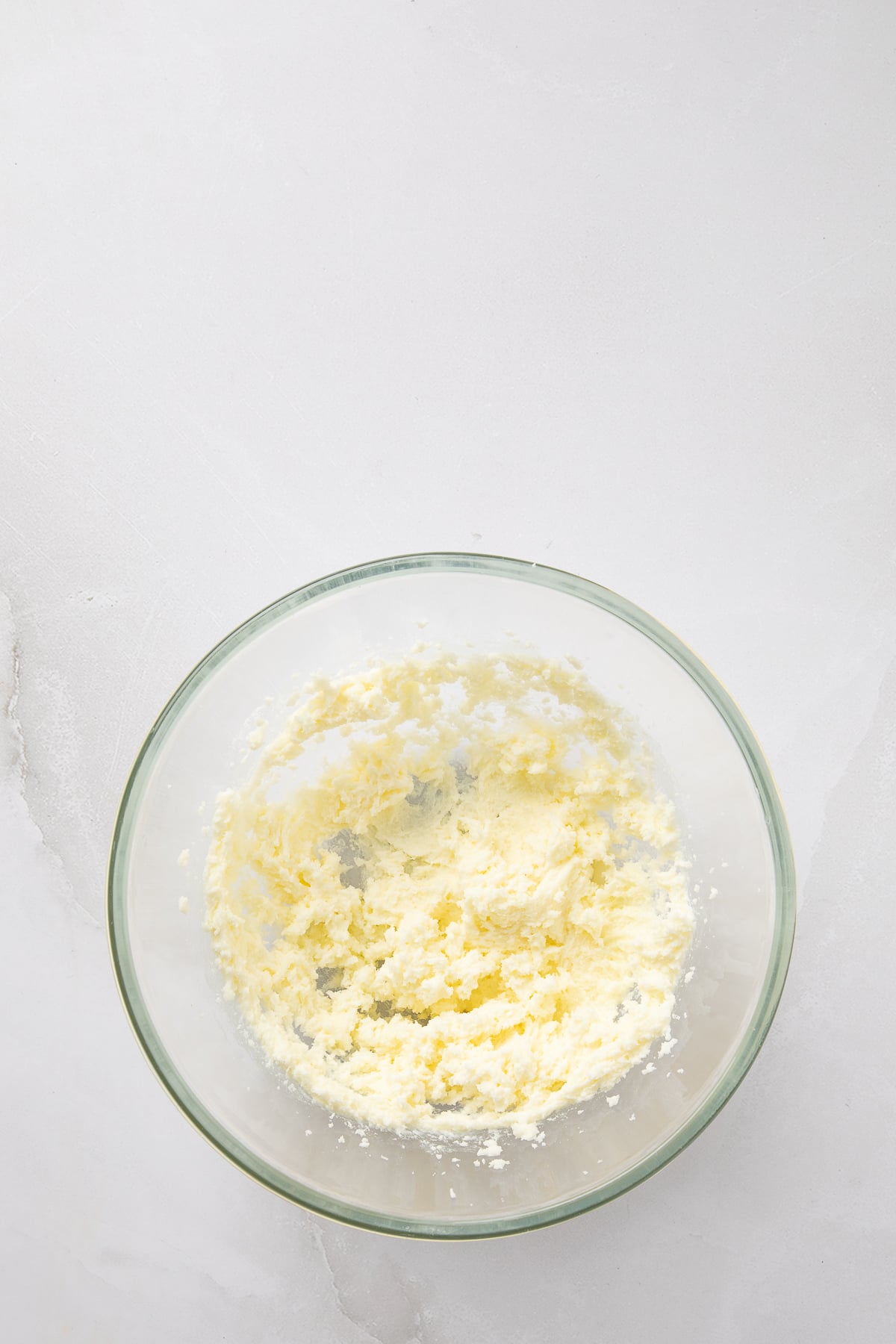 Butter and sugar beat in a bowl.