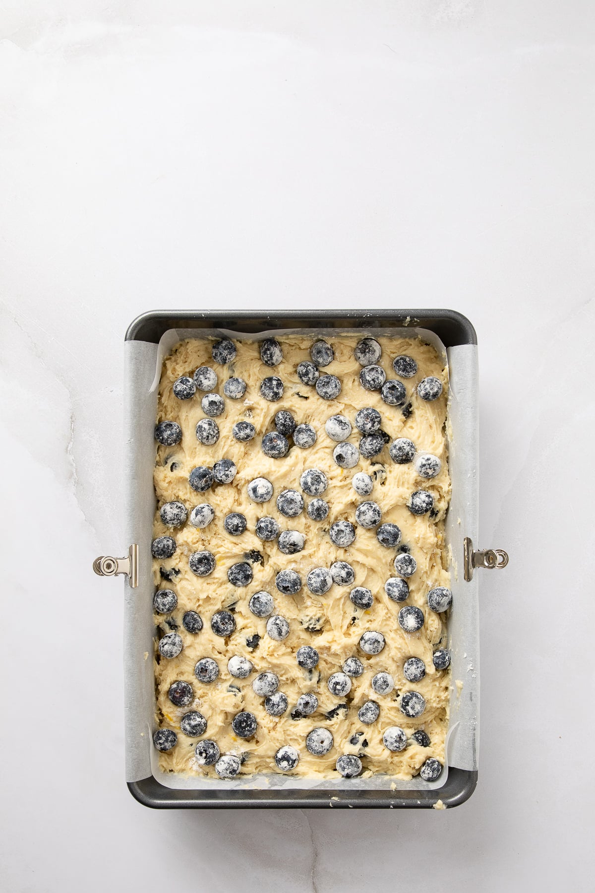 Half of the batter poured into a baking dish.