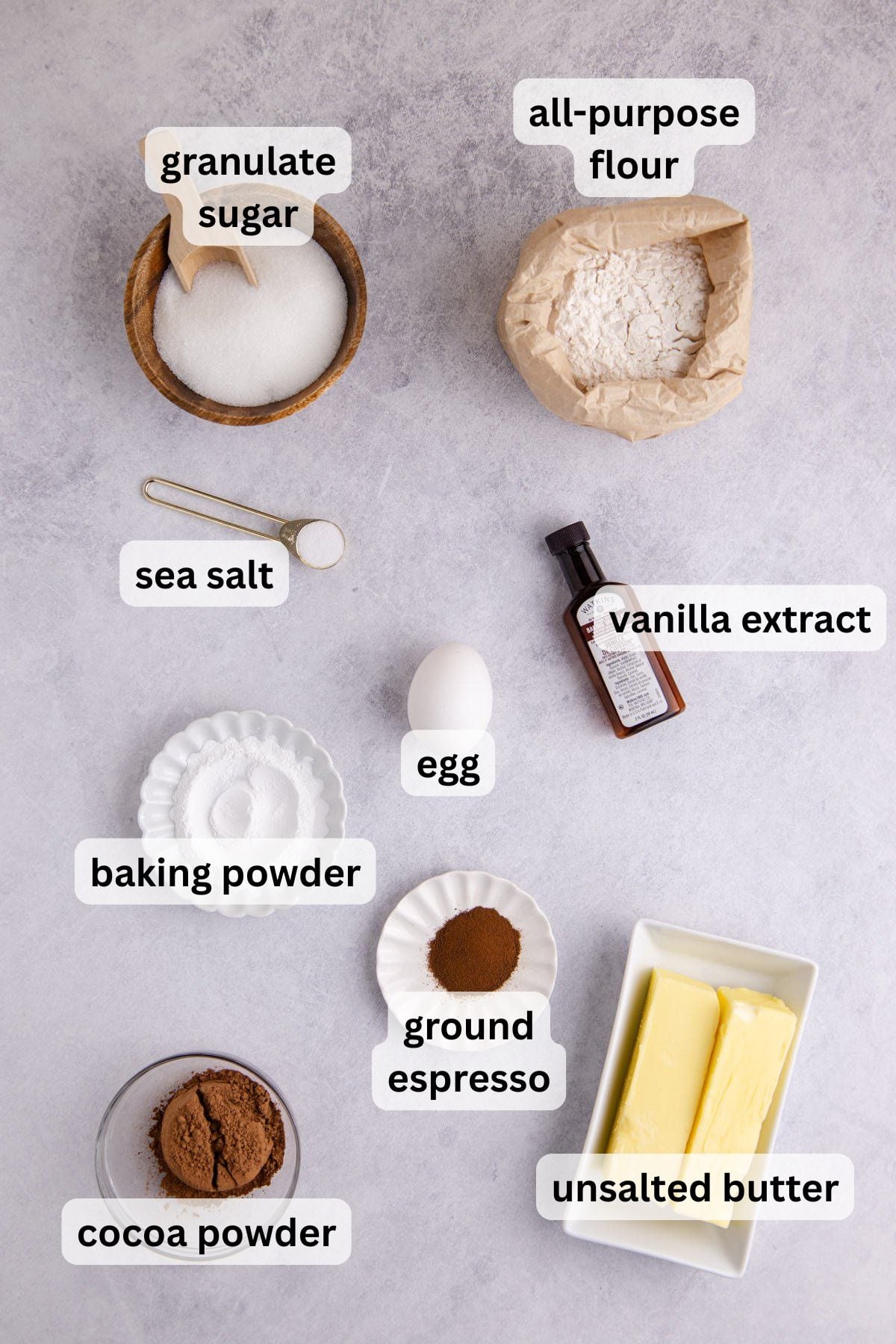 Checkerboard cookie ingredients in bowls on a counter. 