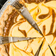 Pumpkin cream cheese pie in a dish.