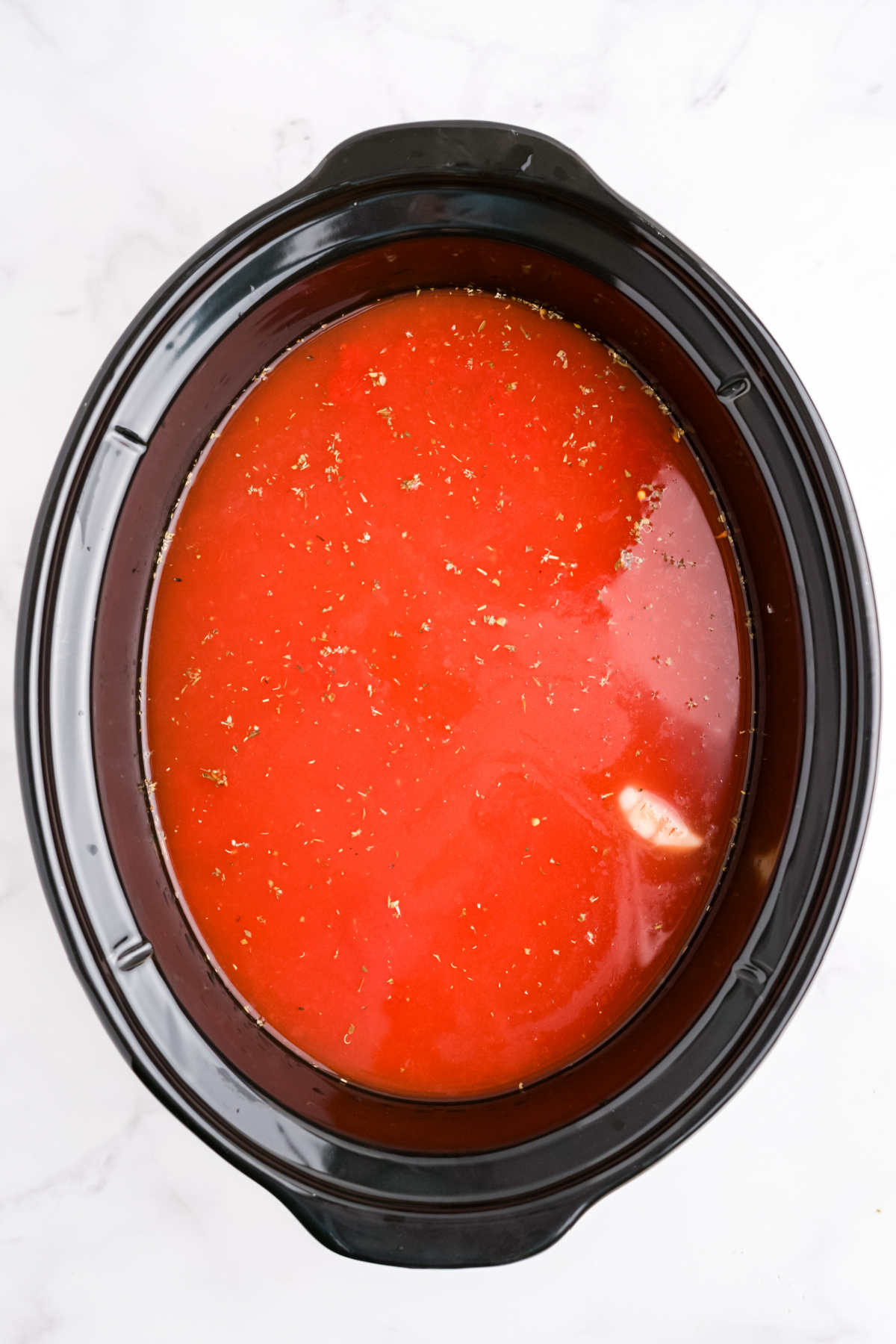 Crushed tomatoes and broth.