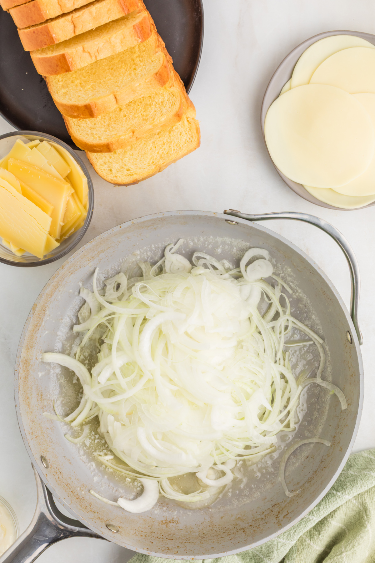 Raw onions in a fry pan