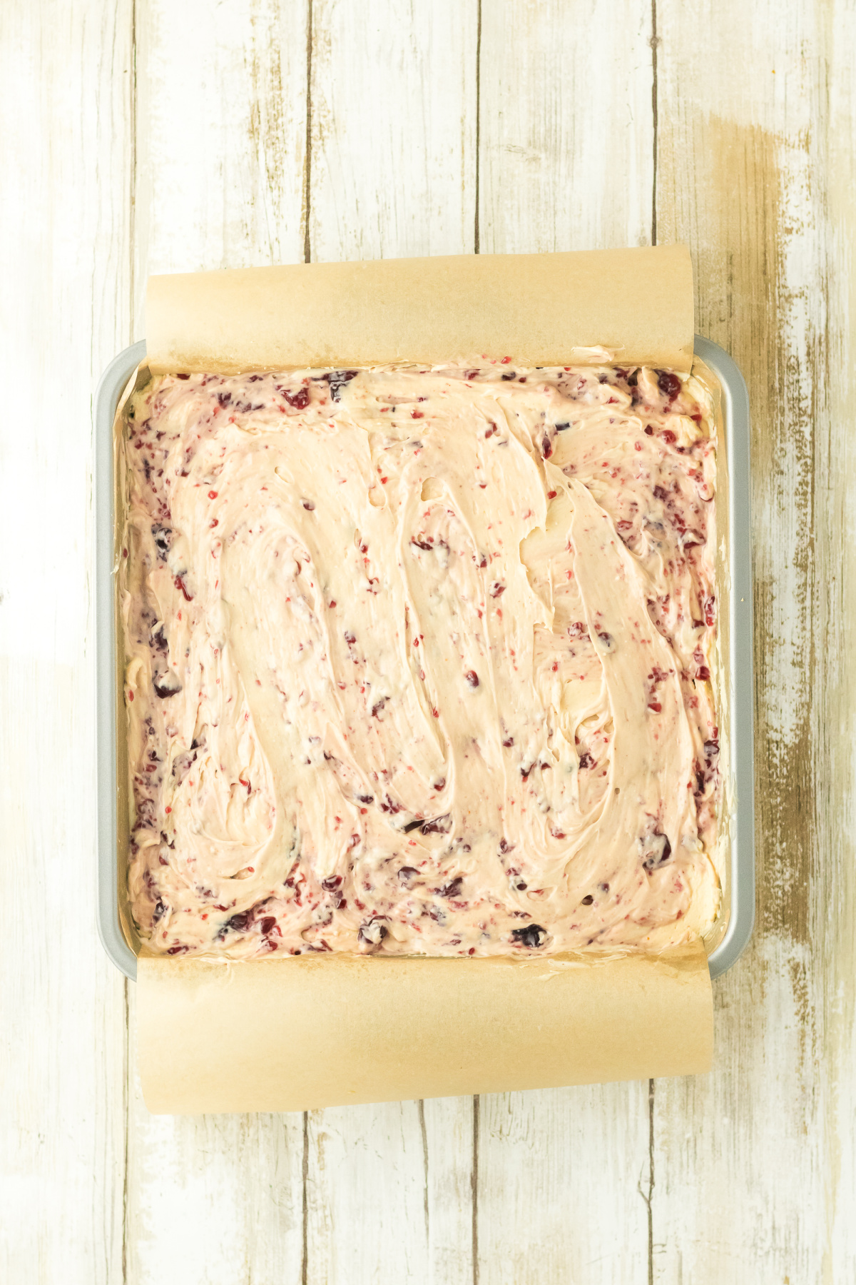 The jelly swirled with the cheesecake.