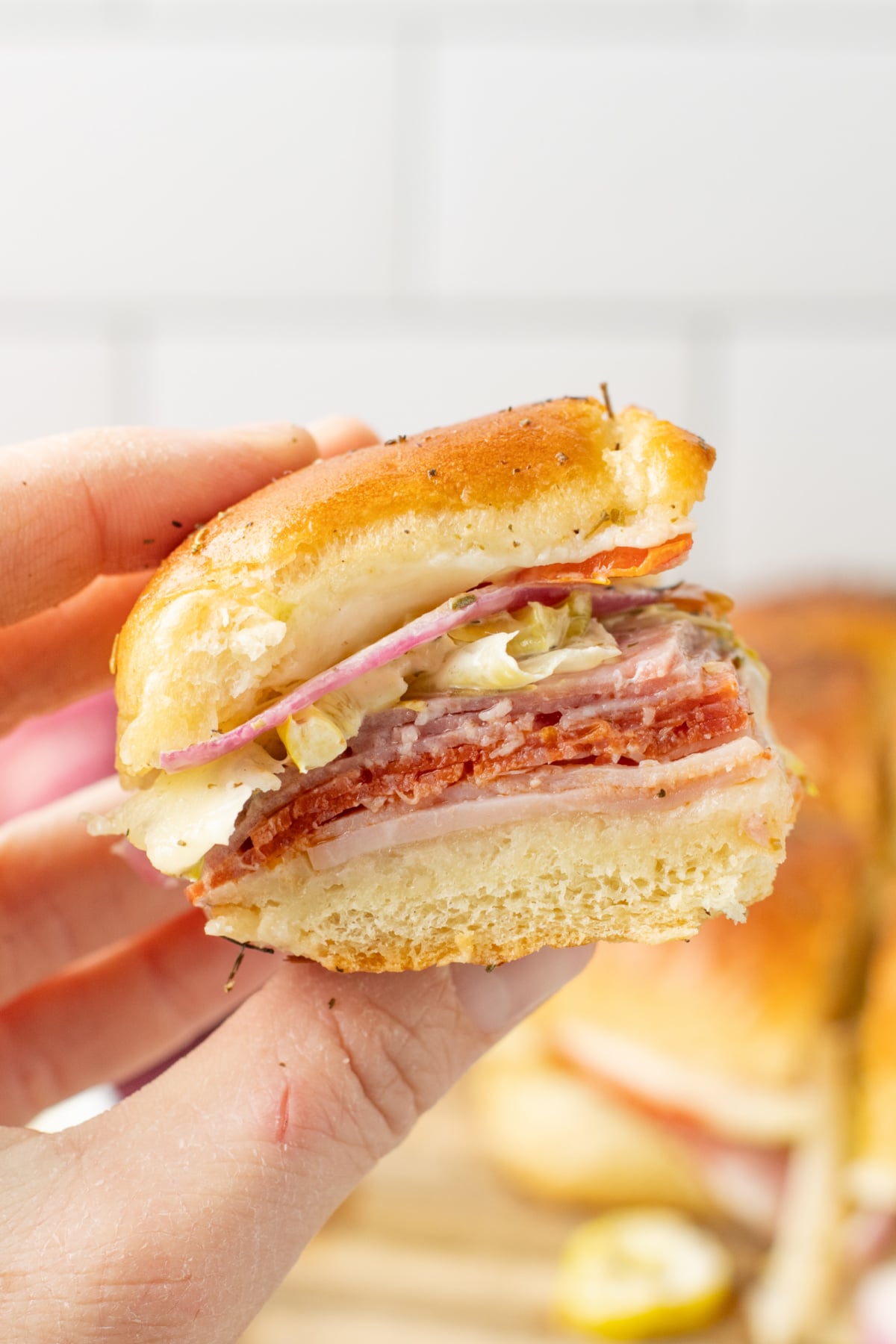 A slider being held up in the air.