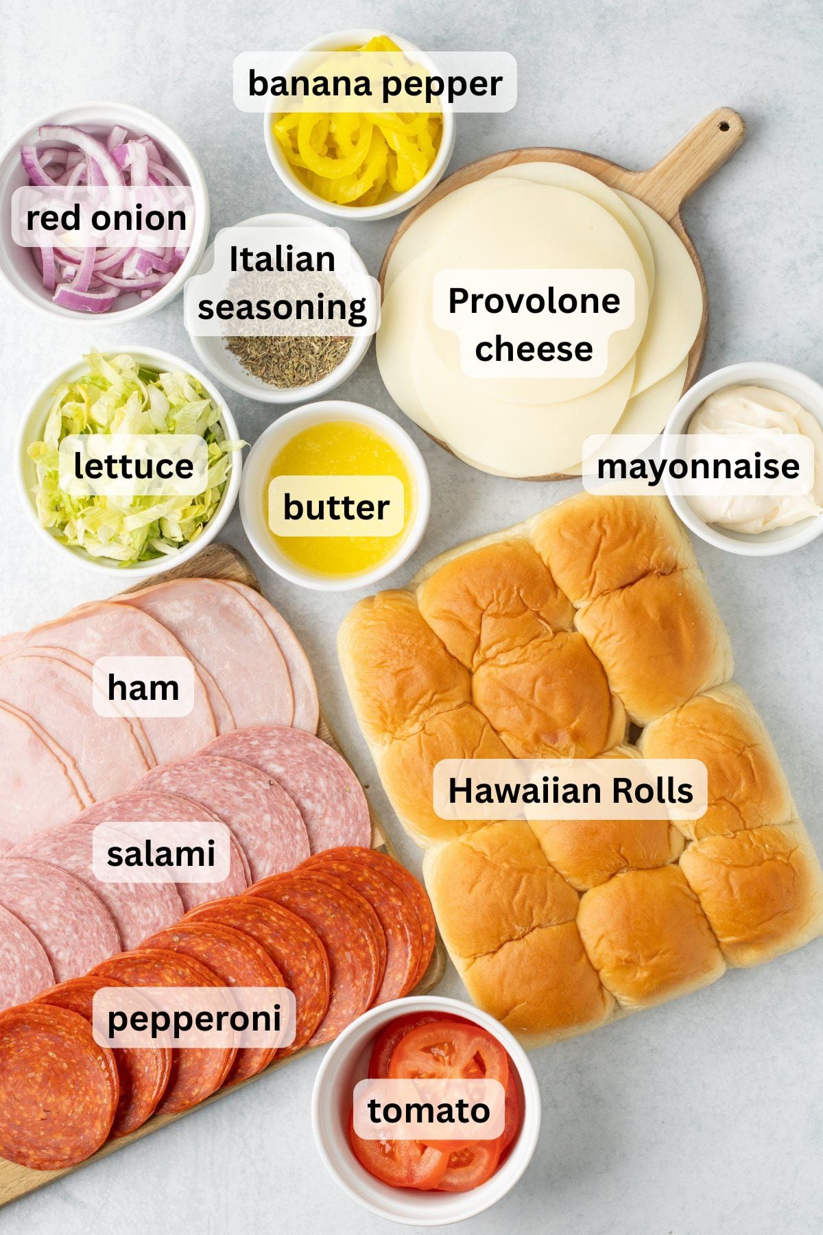 Ingredients to make these sliders on a table.