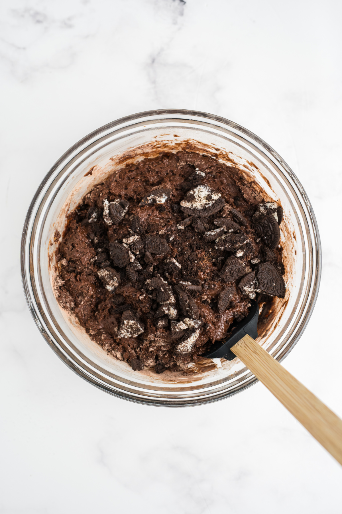 Oreos and chocolate chips added to the dry mixture.