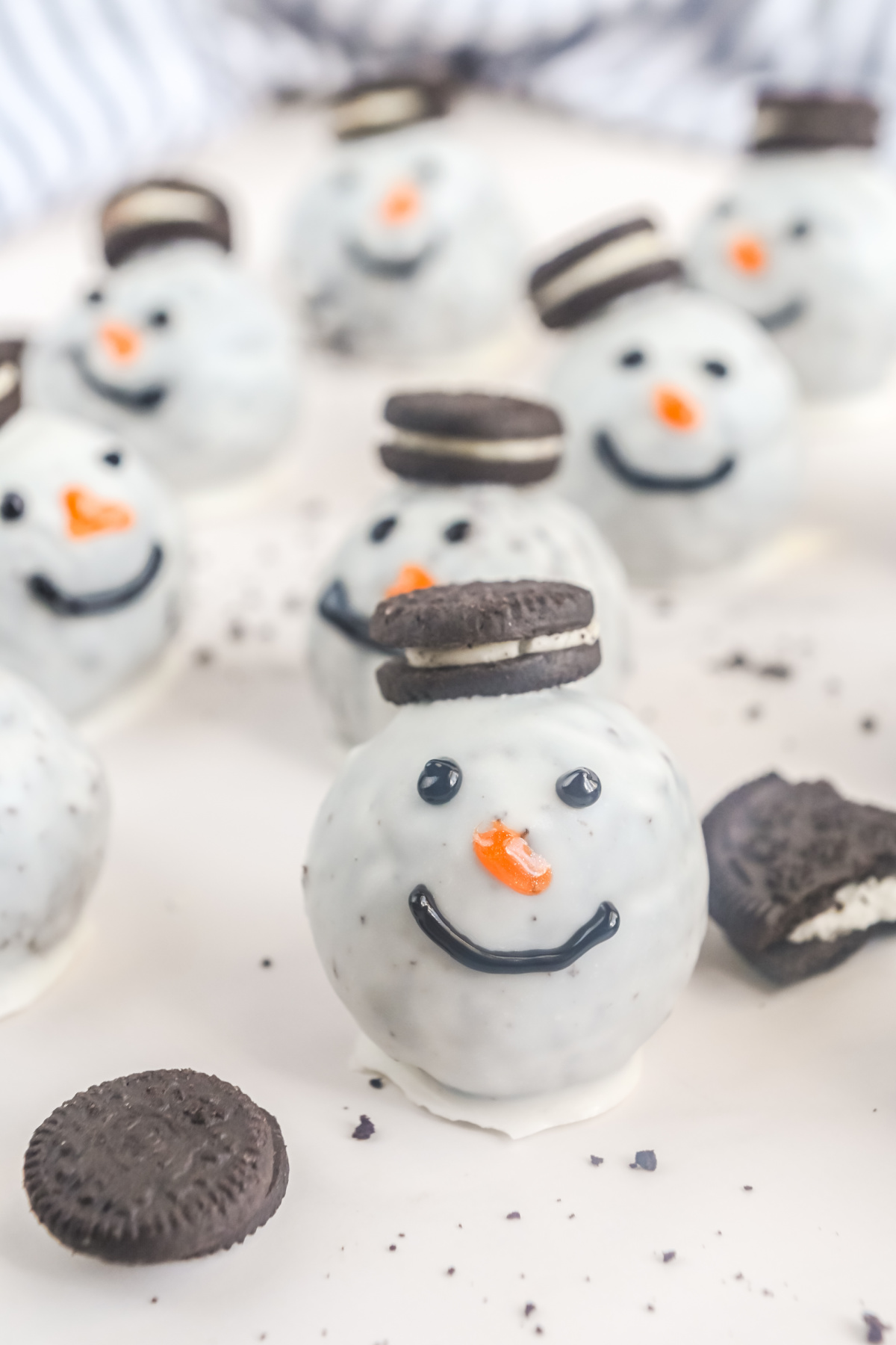 A Oreo ball in the shape of a snowman.