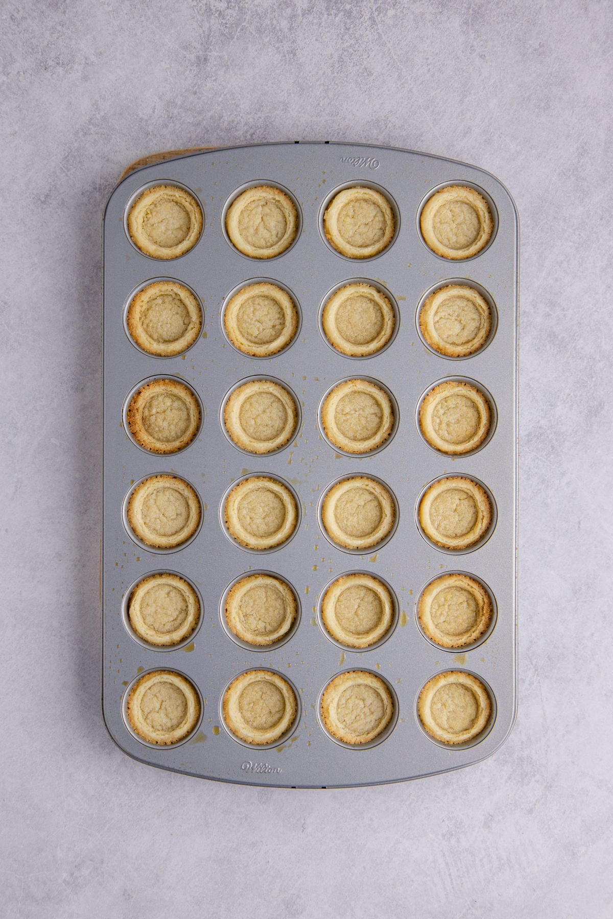 A cavity made about halfway down each cookie.