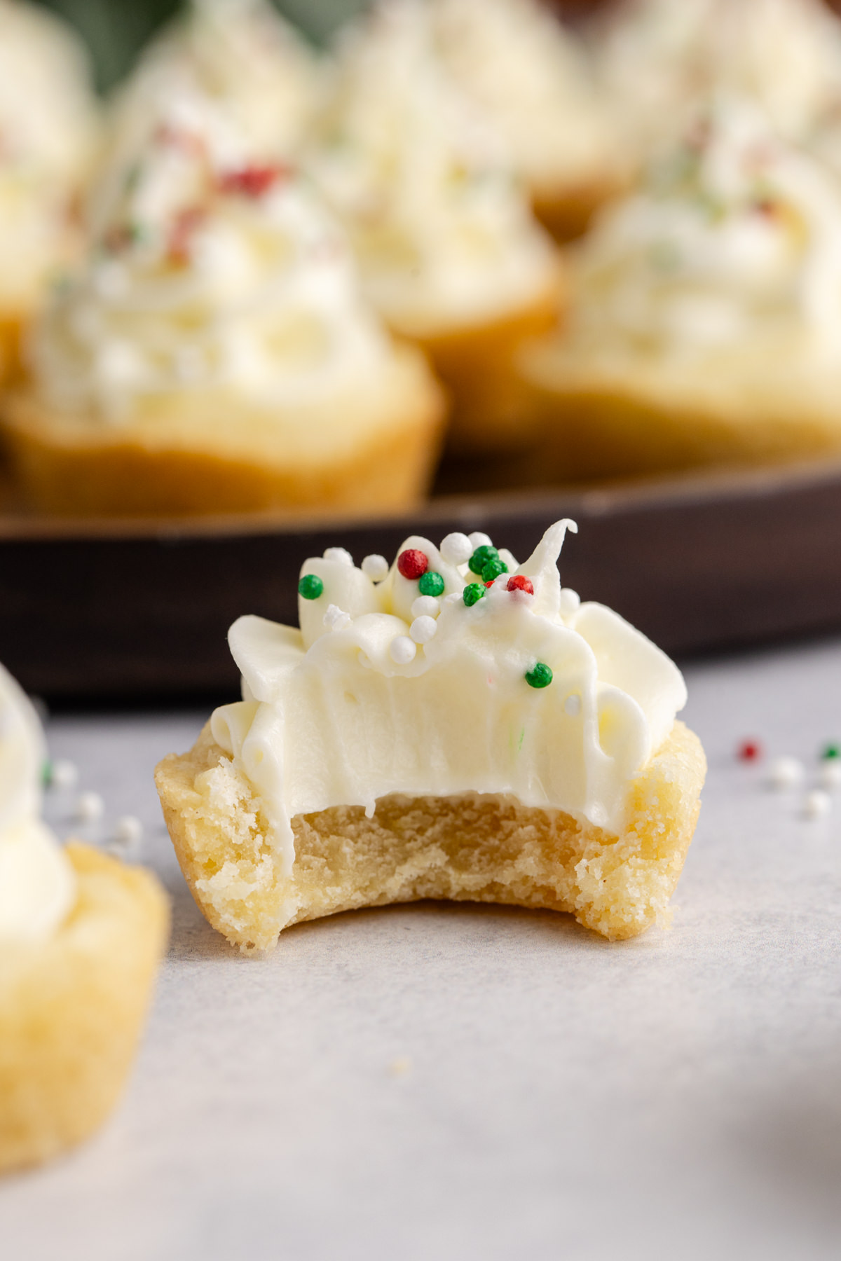 A cookie cup with a bite taken out of it.