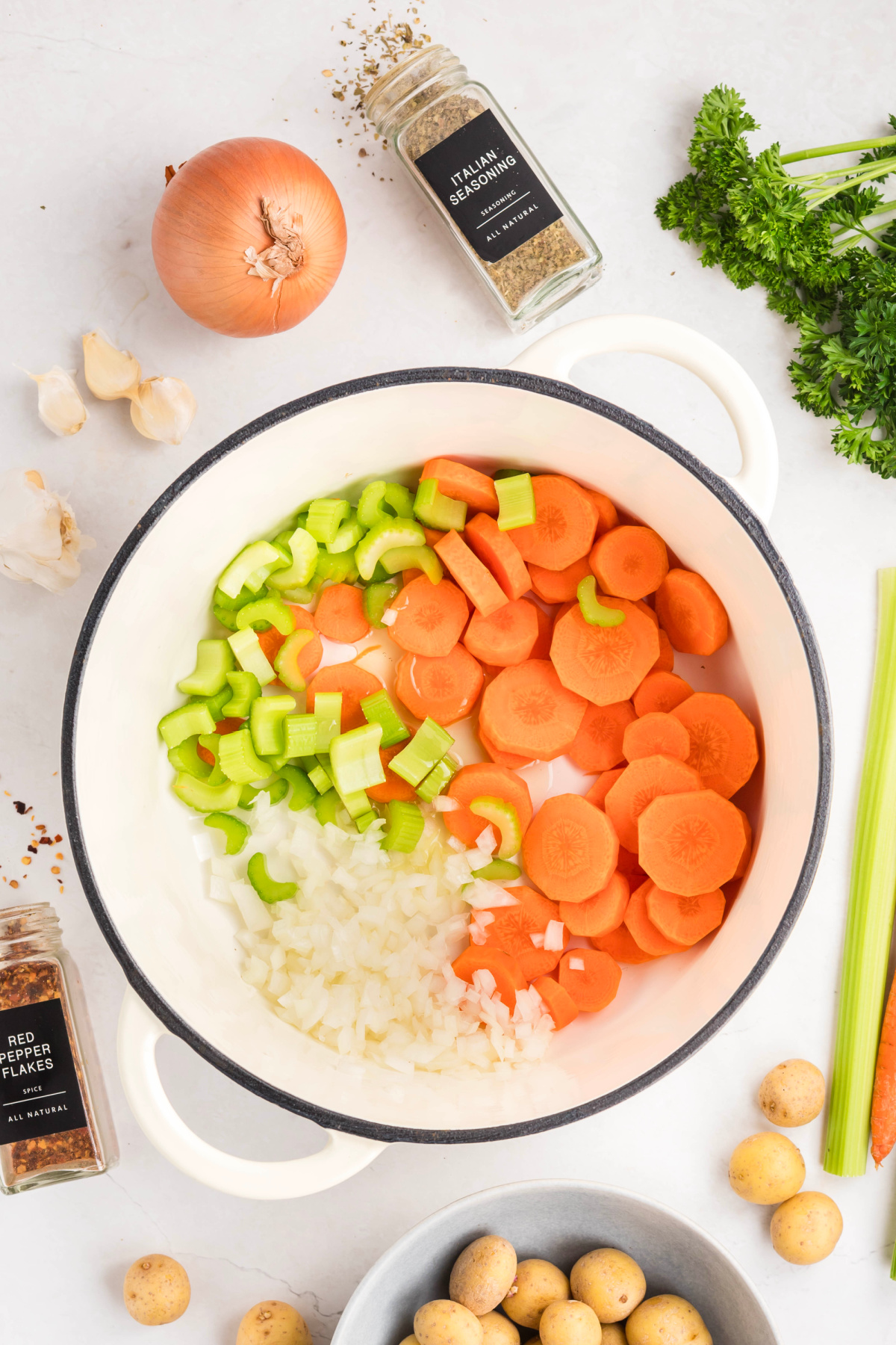 Carrots, onions, and celery in a large pot.