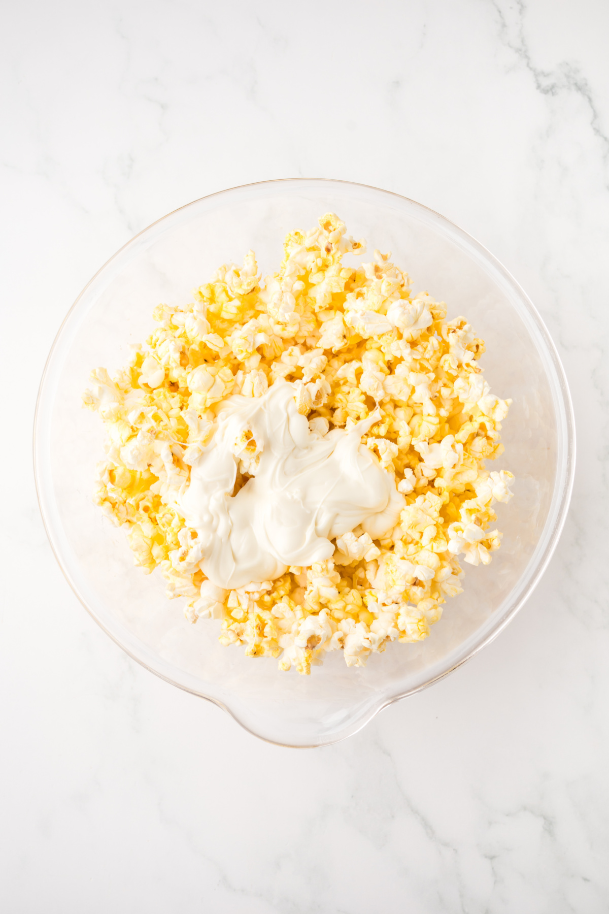 Popped popcorn with white chocolate added.