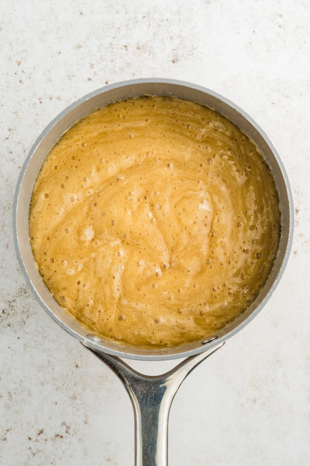 The mixture resting and starting to foam up.