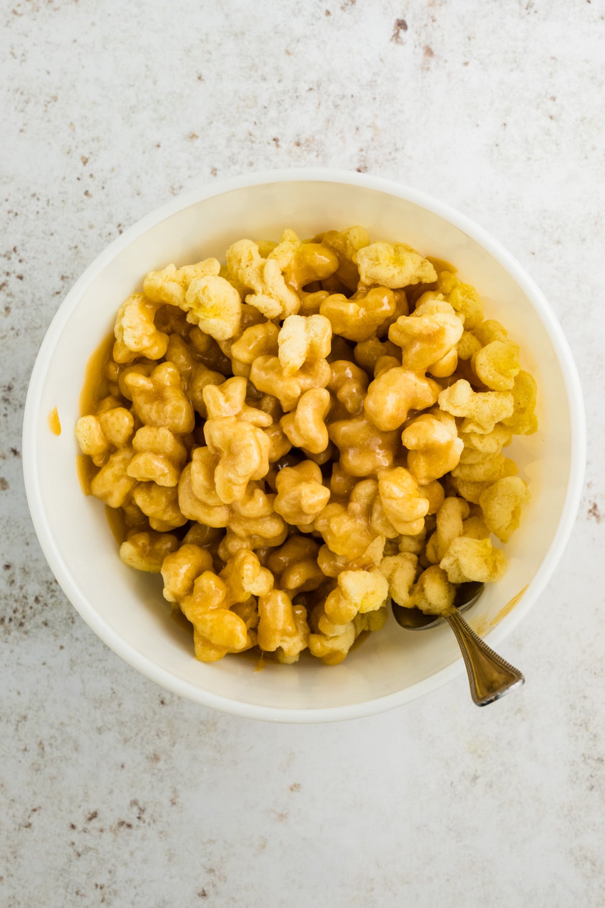 The puffed corn coated with the mixture.