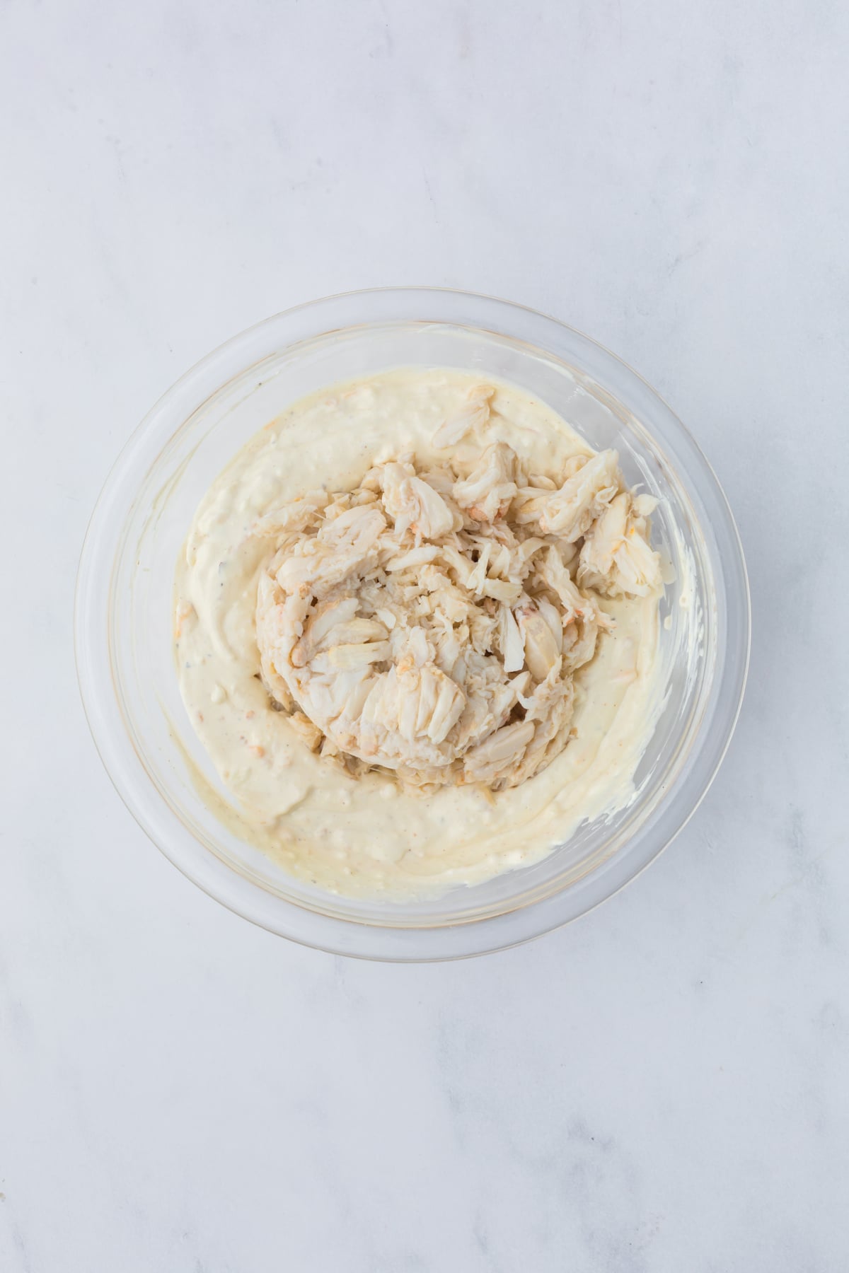 The crabmeat added to the mixture.