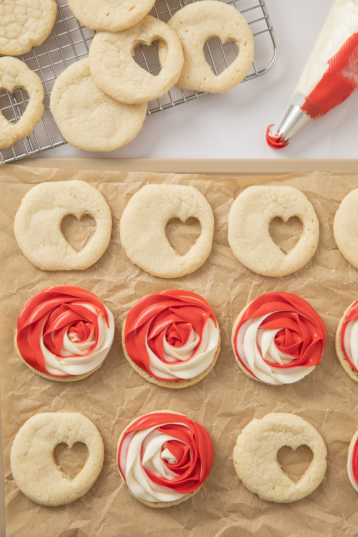 Frosting piped on top of the cookie.