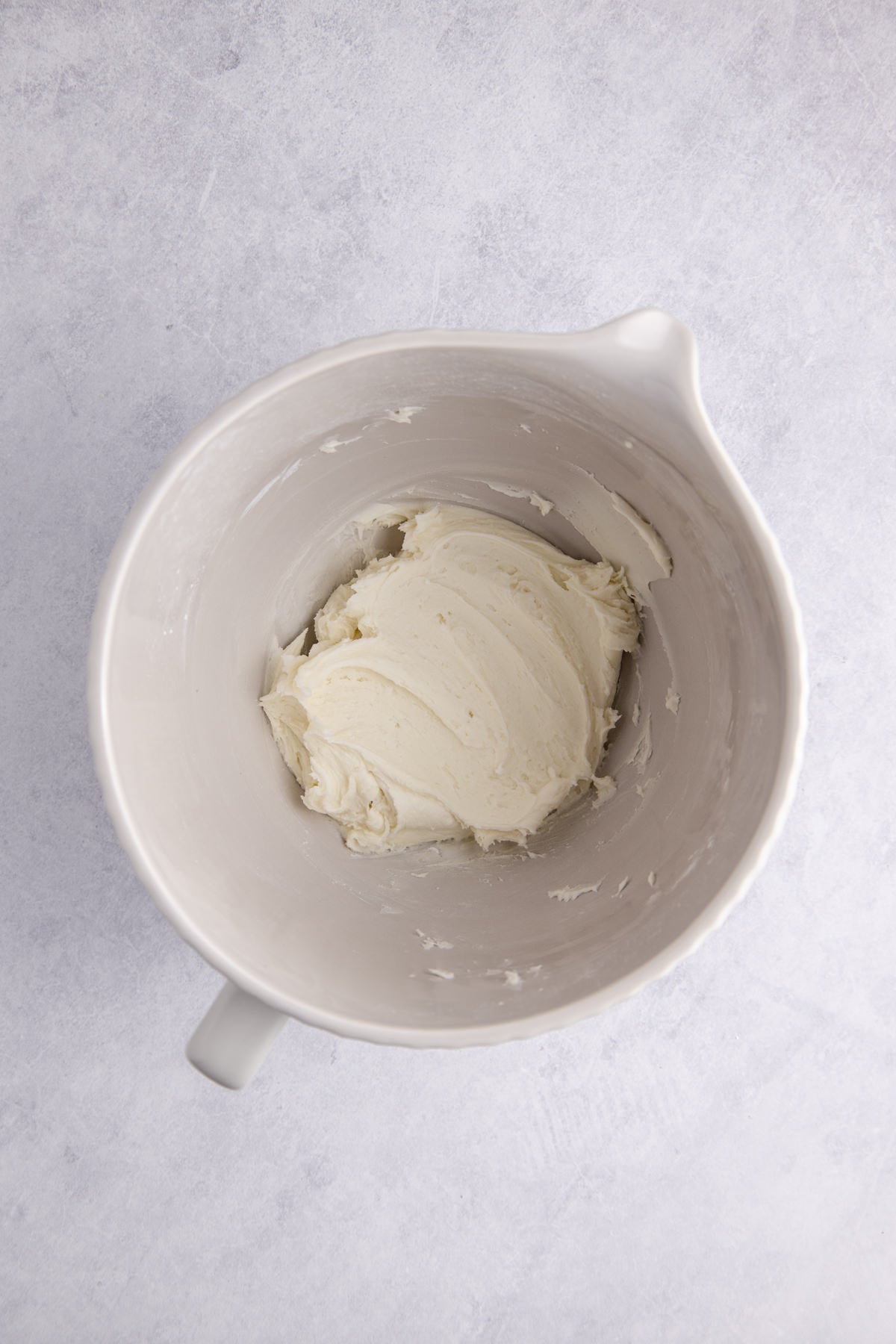Frosting ingredients combined in a bowl.