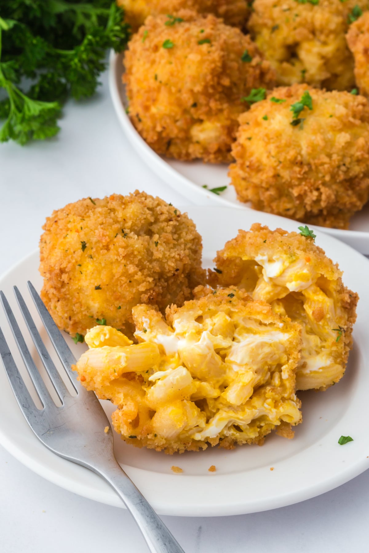 A plate with mac and cheese balls.