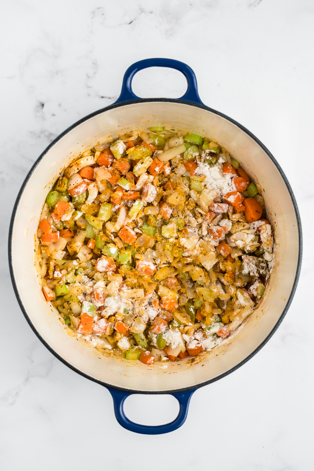 Butter, carrots, onion, celery and flour added to the dutch oven.