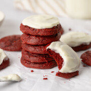 Red velvet cake mix cookies stacked on top of one another.