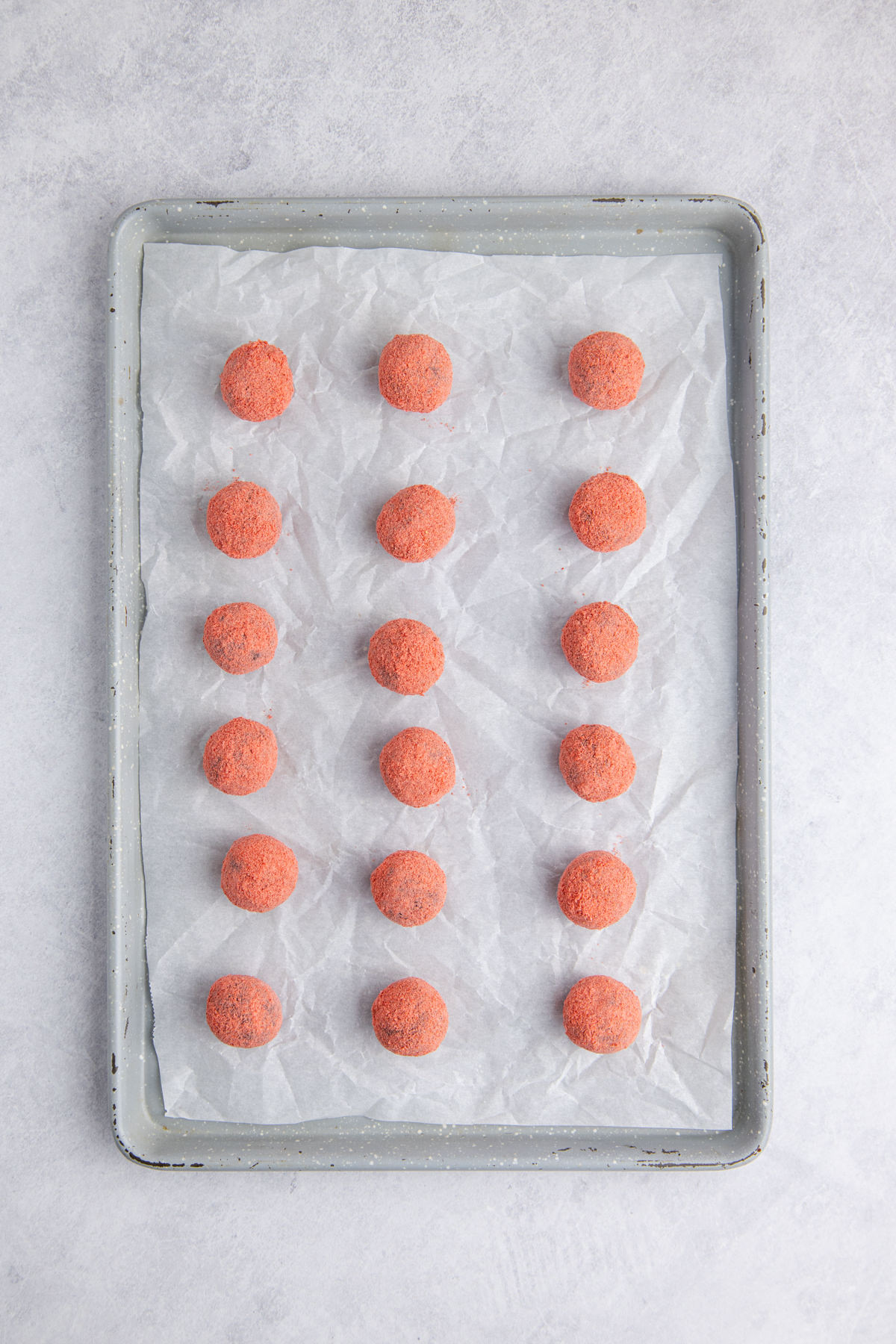 The truffles on a baking sheet chilled.