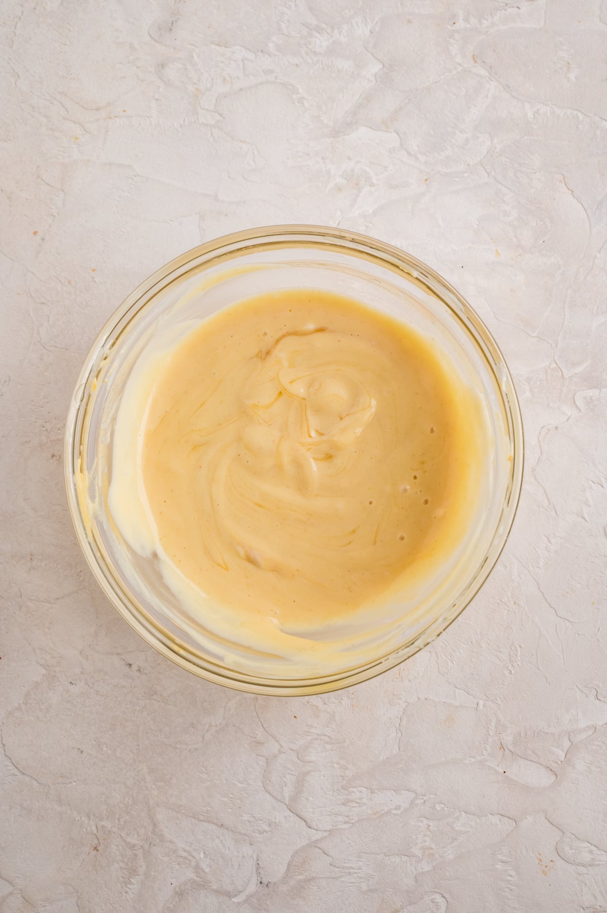 Mayo, Dijon, and honey in a bowl for the sauce.