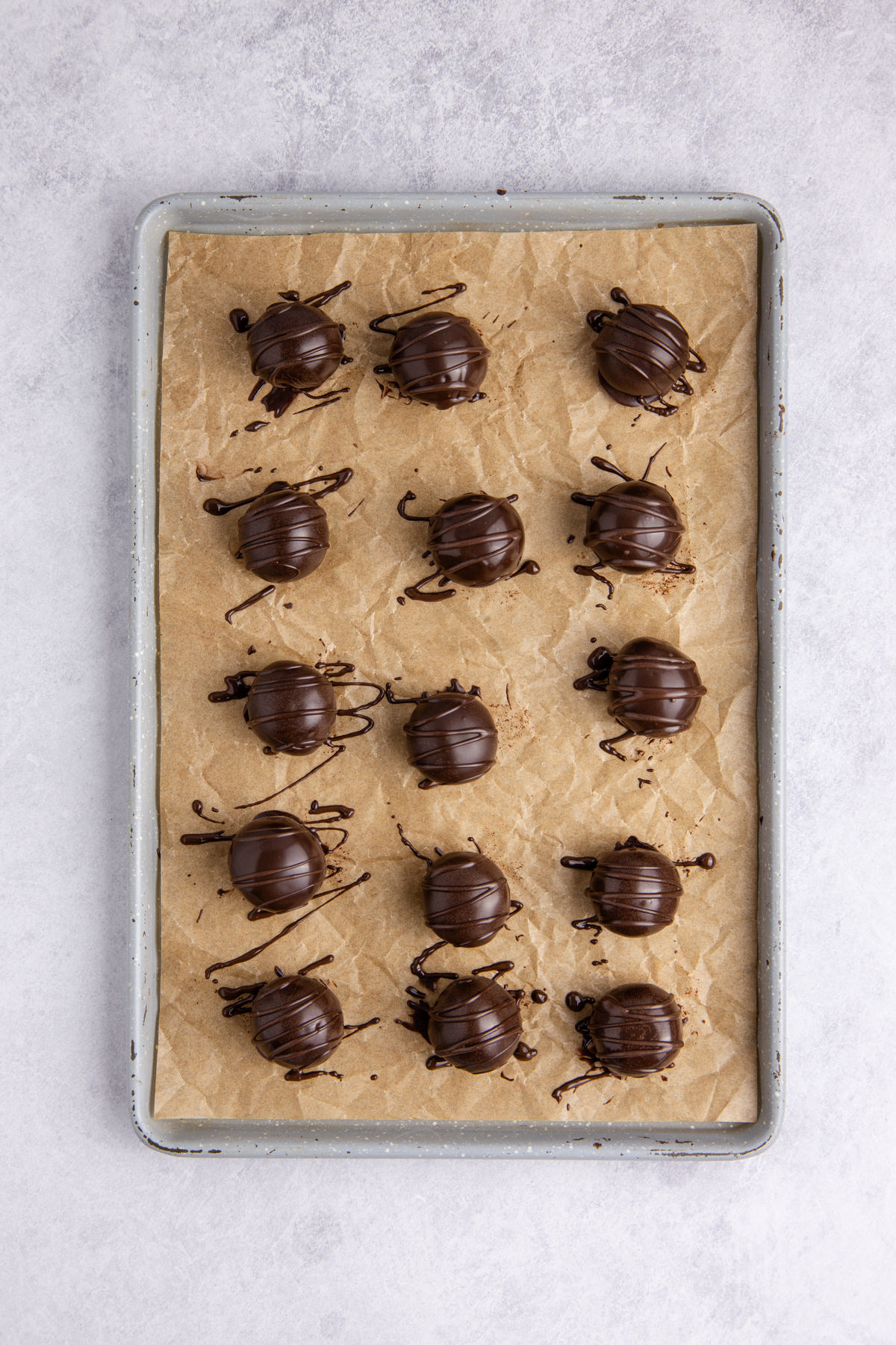 Chocolate drizzled over top after chilled and set.