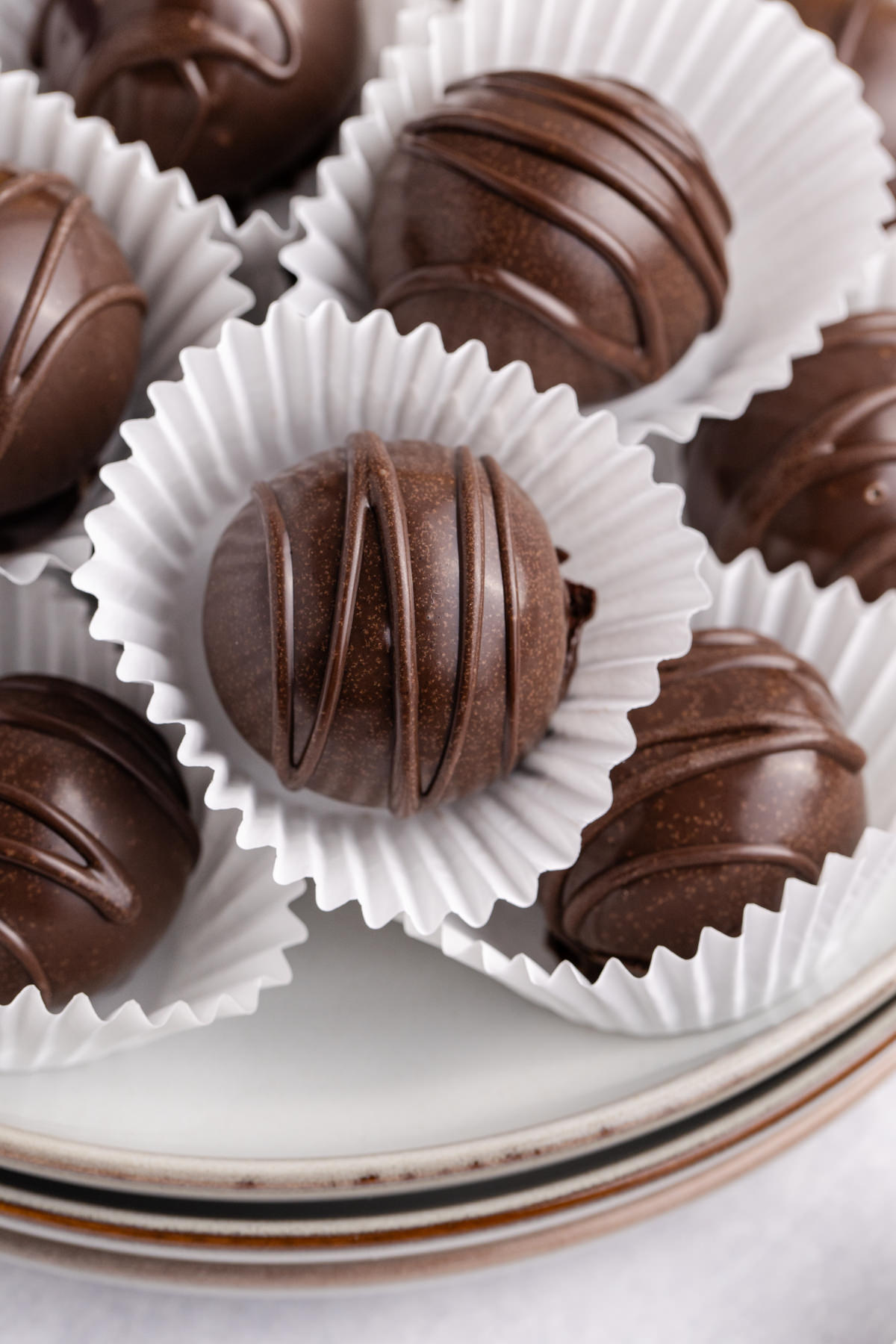 A pile of truffles on a plate.