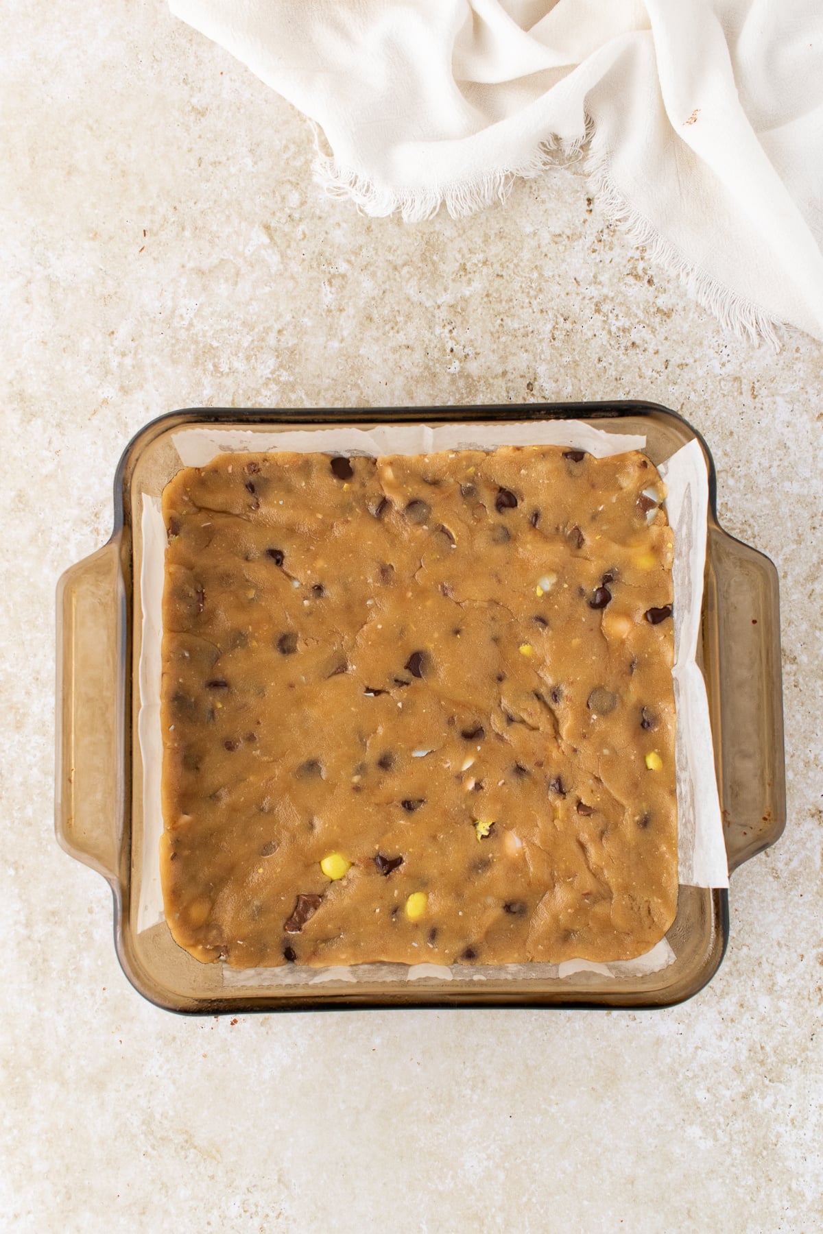Dry and wet ingredients mixed and spread into a baking dish.