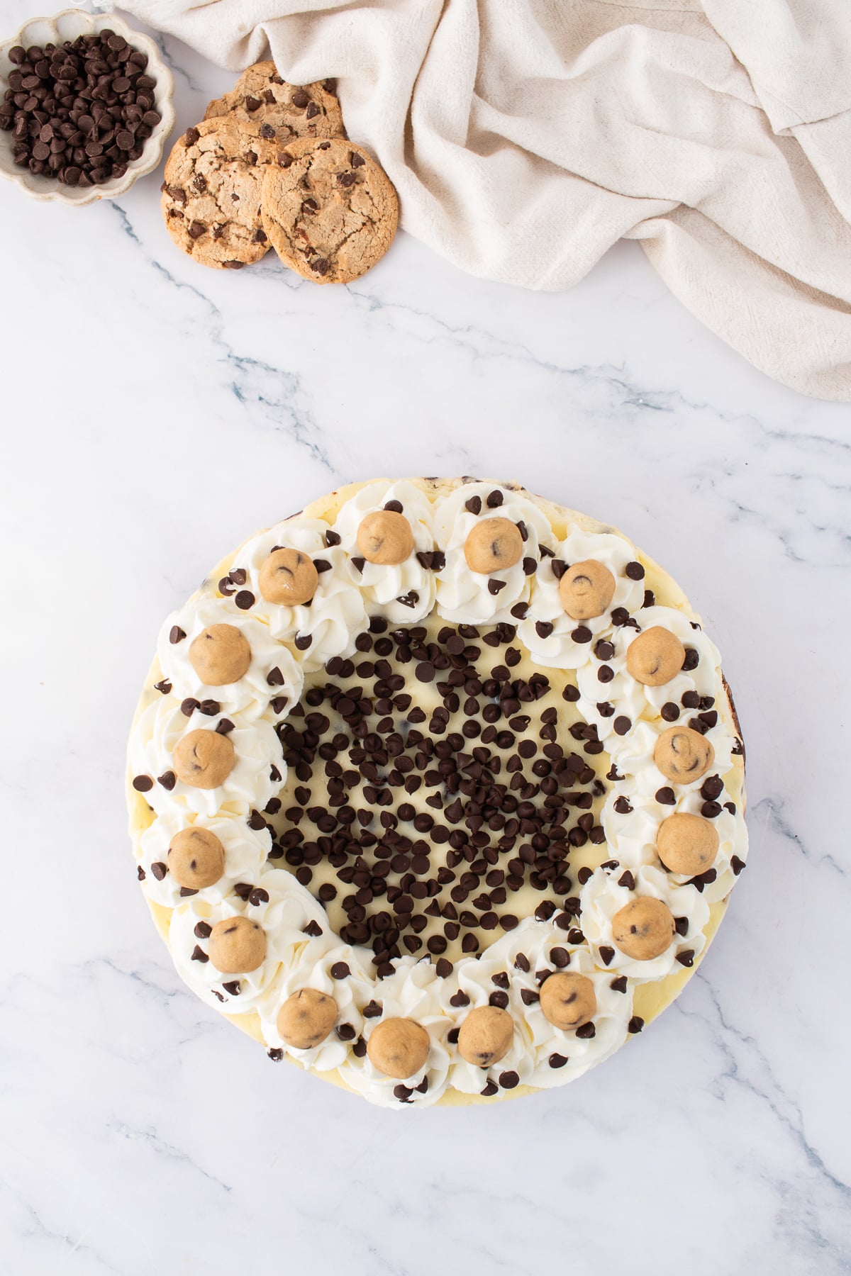 Whipped cream, cookie dough and chocolate chips added to the top.