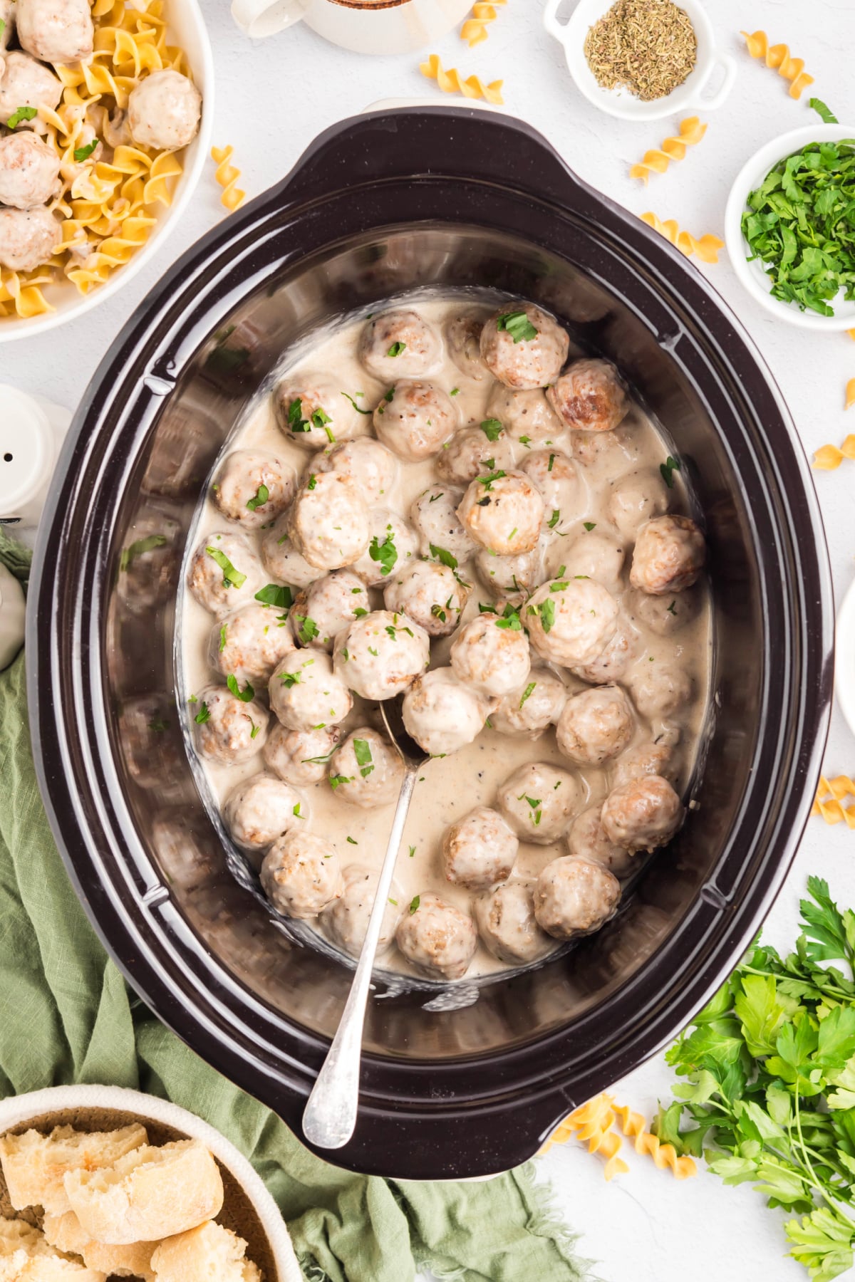 Parsley sprinkled over top of the meatballs.