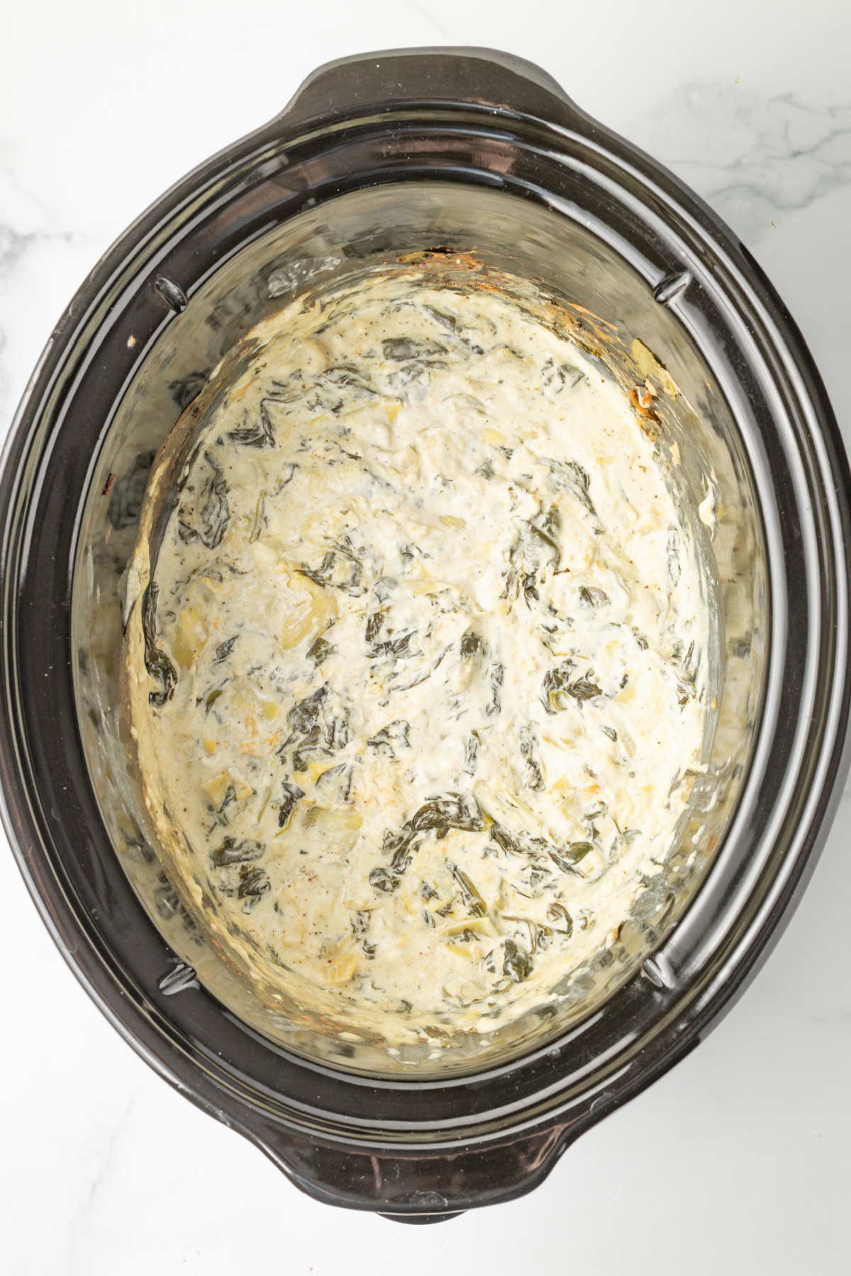 The dip cooked in the crockpot.