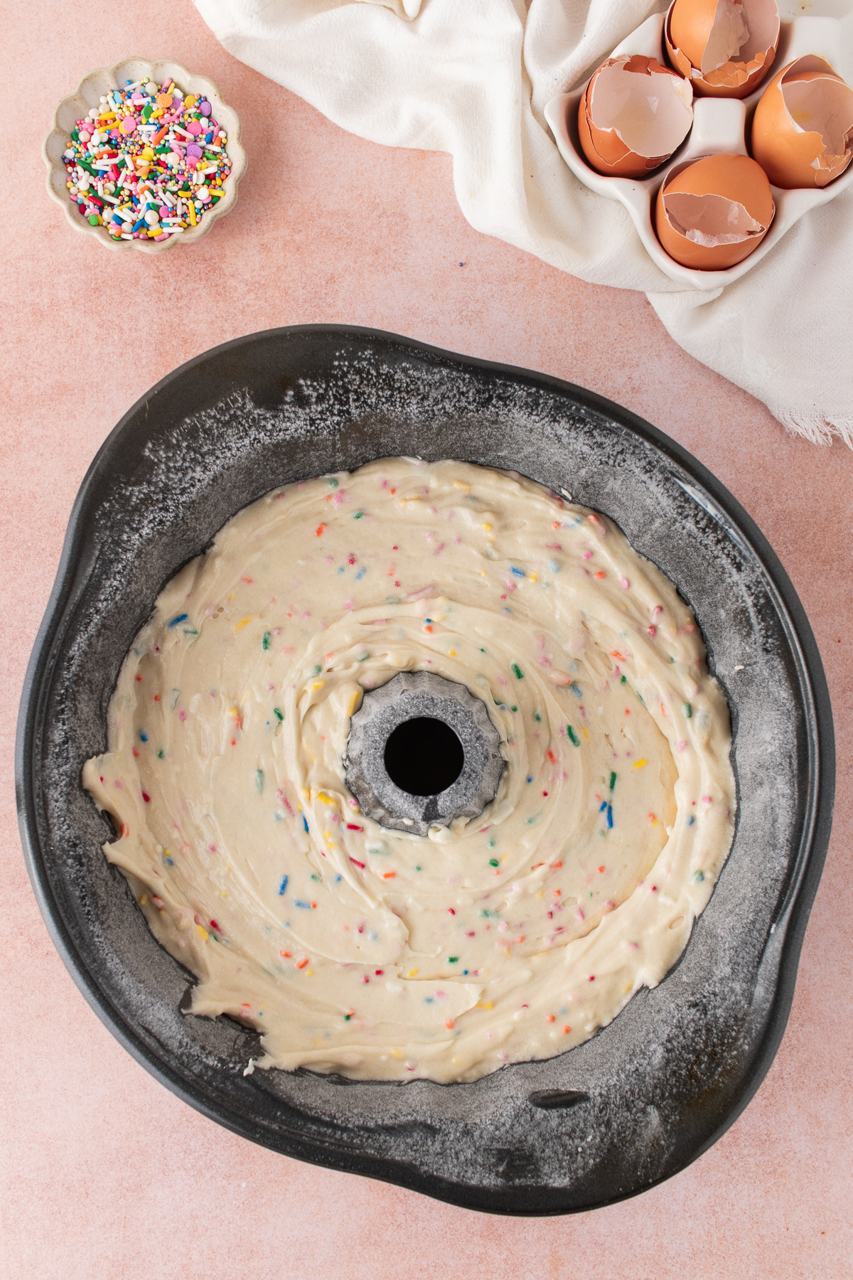 The batter poured into the bundt pan.