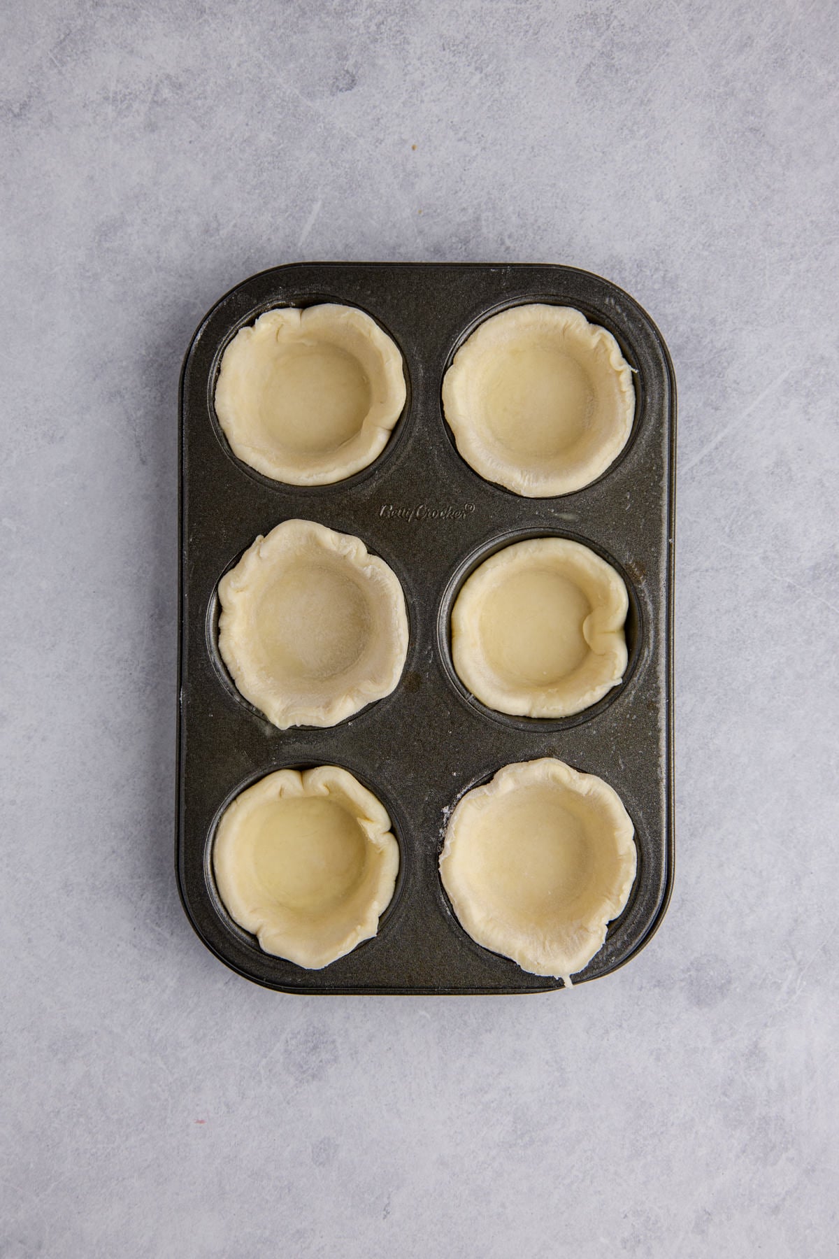 Rounds placed in muffin pan.
