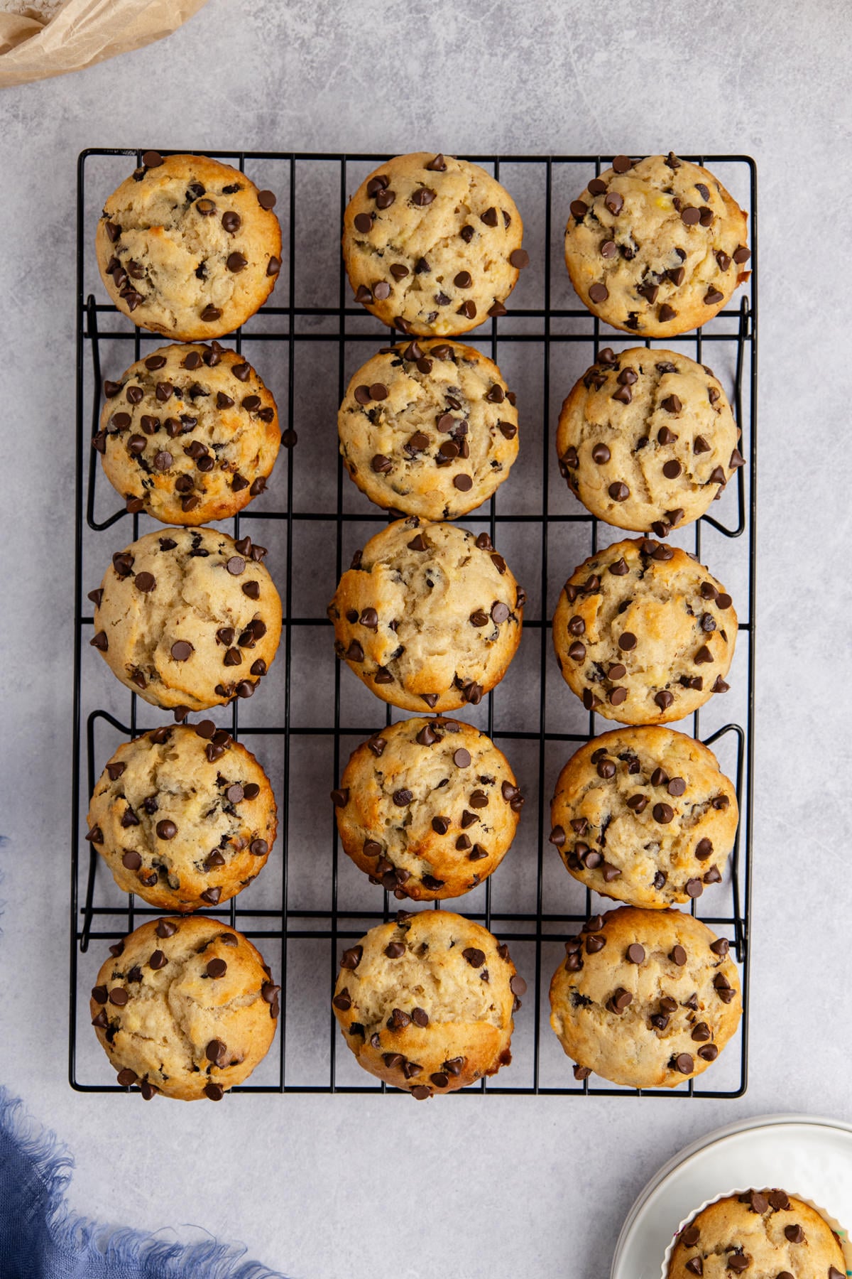 Cooked muffins cooling on a wire rack.
