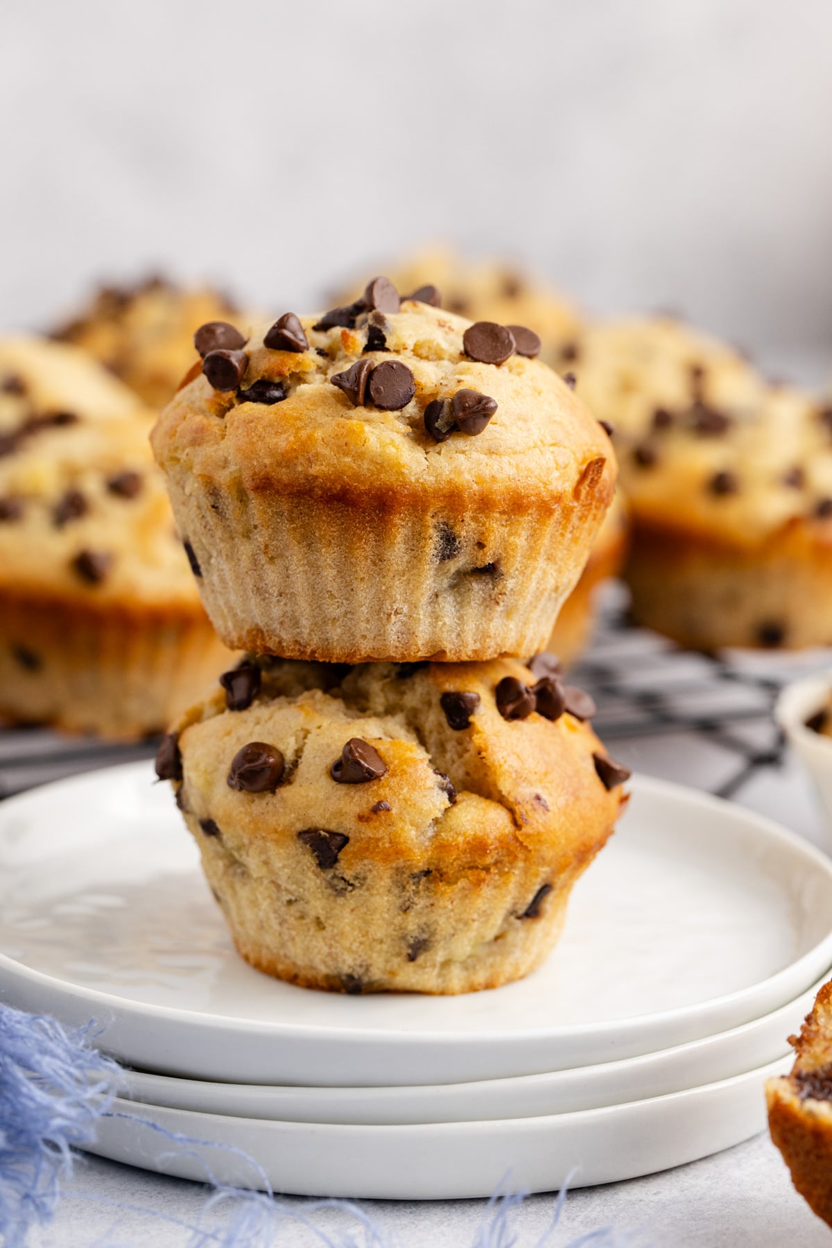 Muffins with peanut butter and bananas stacked on top of one another.