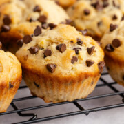 Peanut butter banana muffins on a cooling rack.