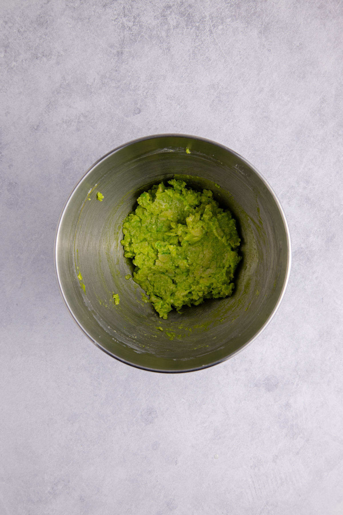 Butter and sugar beaten in a bowl.