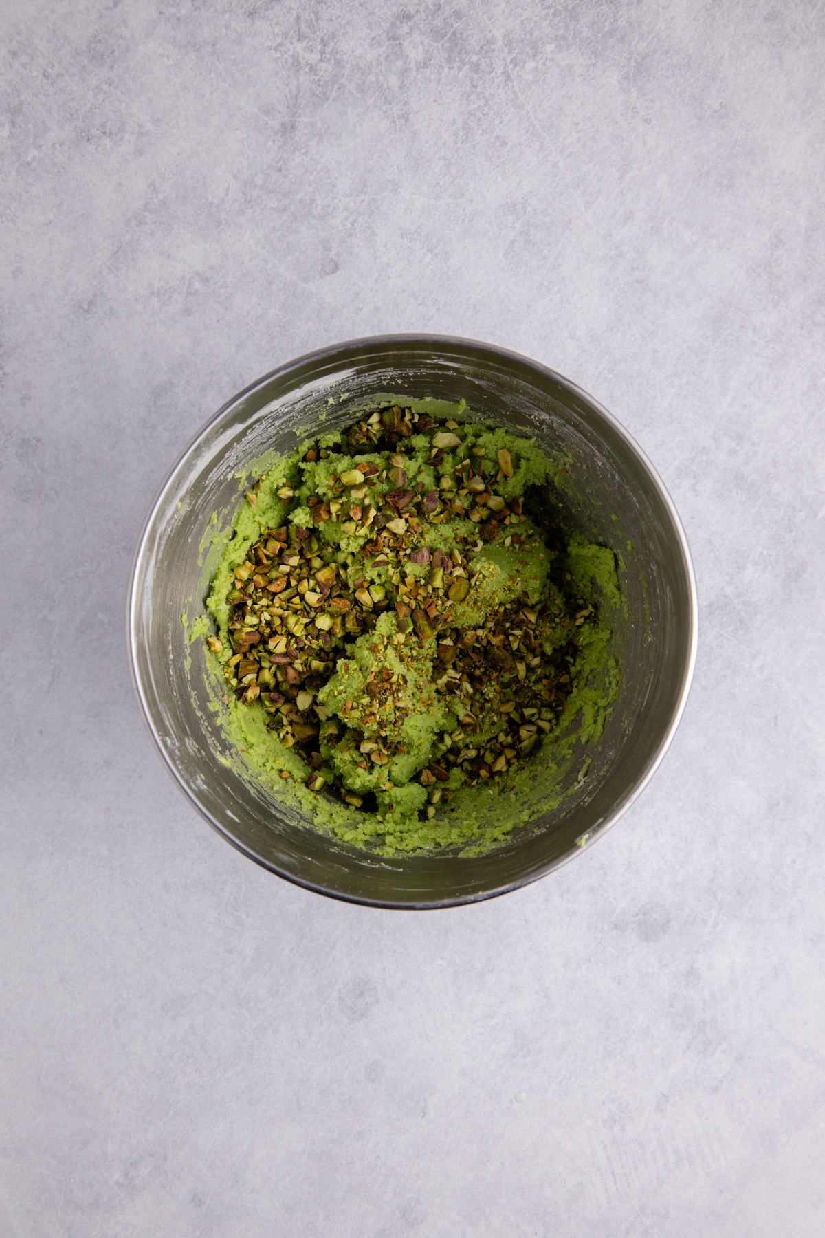 Chopped pistachios added to the cookie dough.