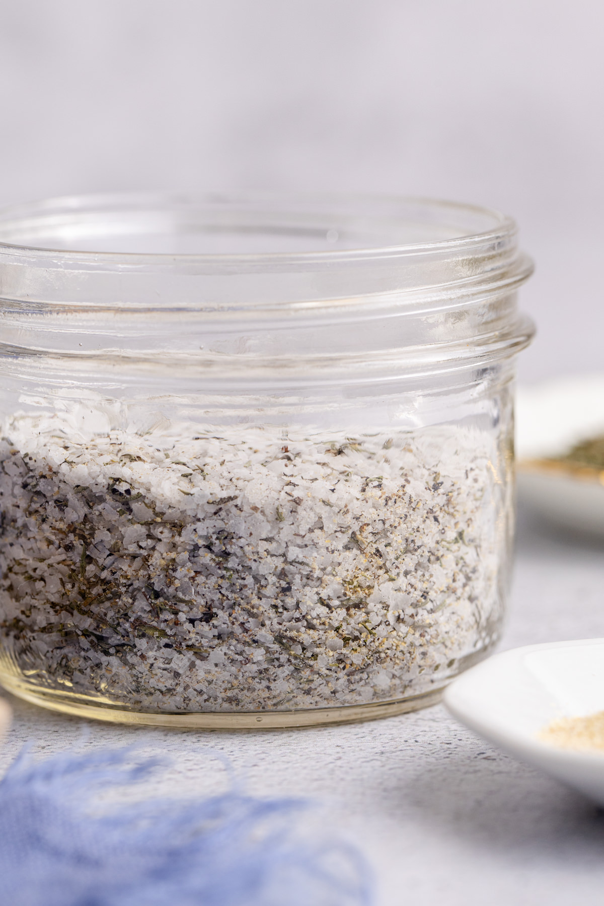 Spice rub in a glass jar.