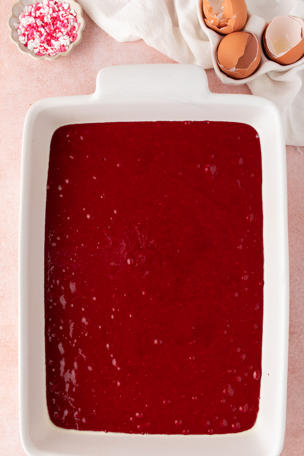 Cake mixture added into a prepared baking dish.