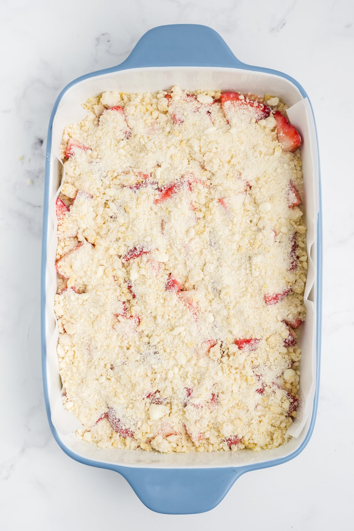 The remaining crumble mixture added to the top of the berries.