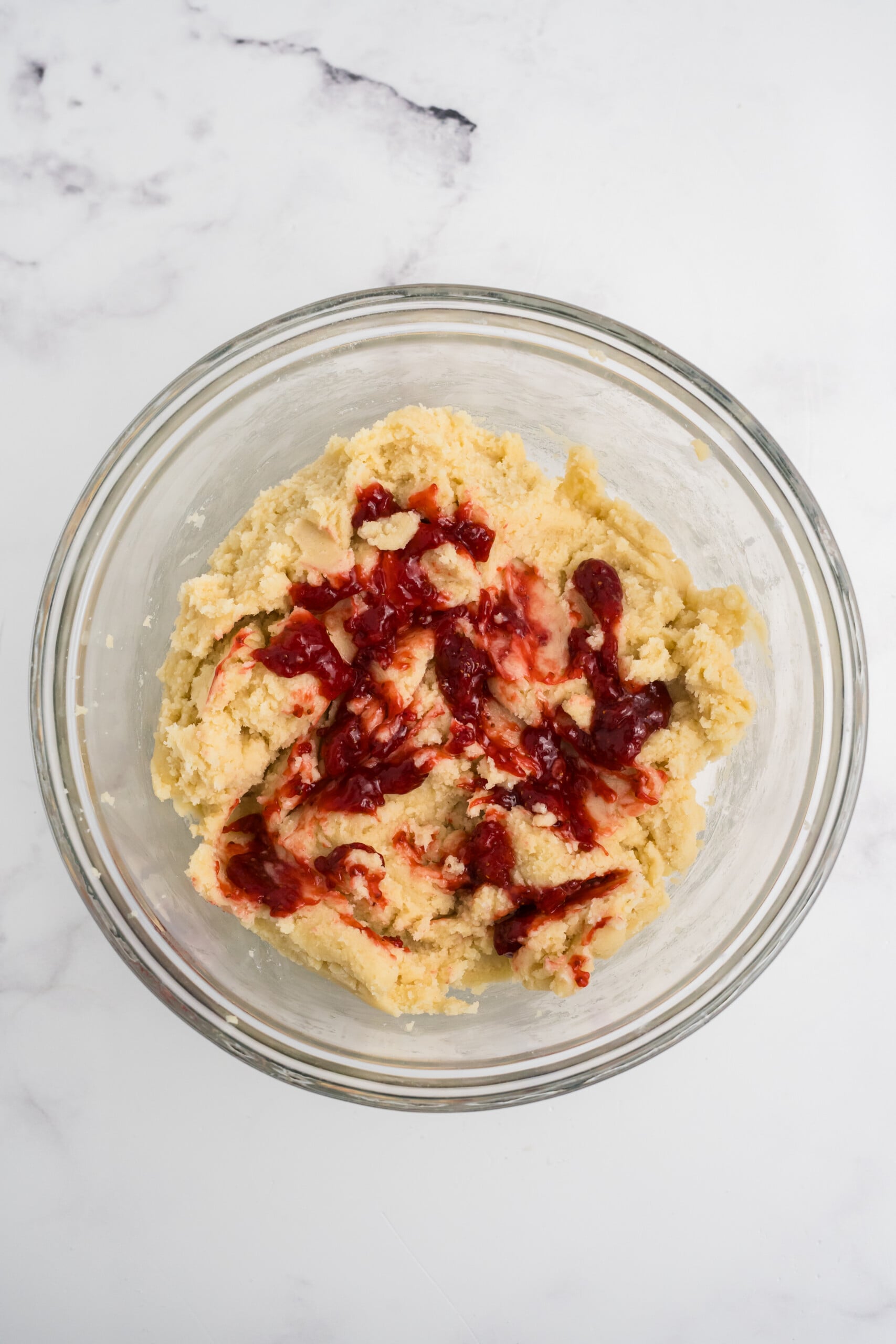 Dry and wet ingredients mixed together in a bowl.