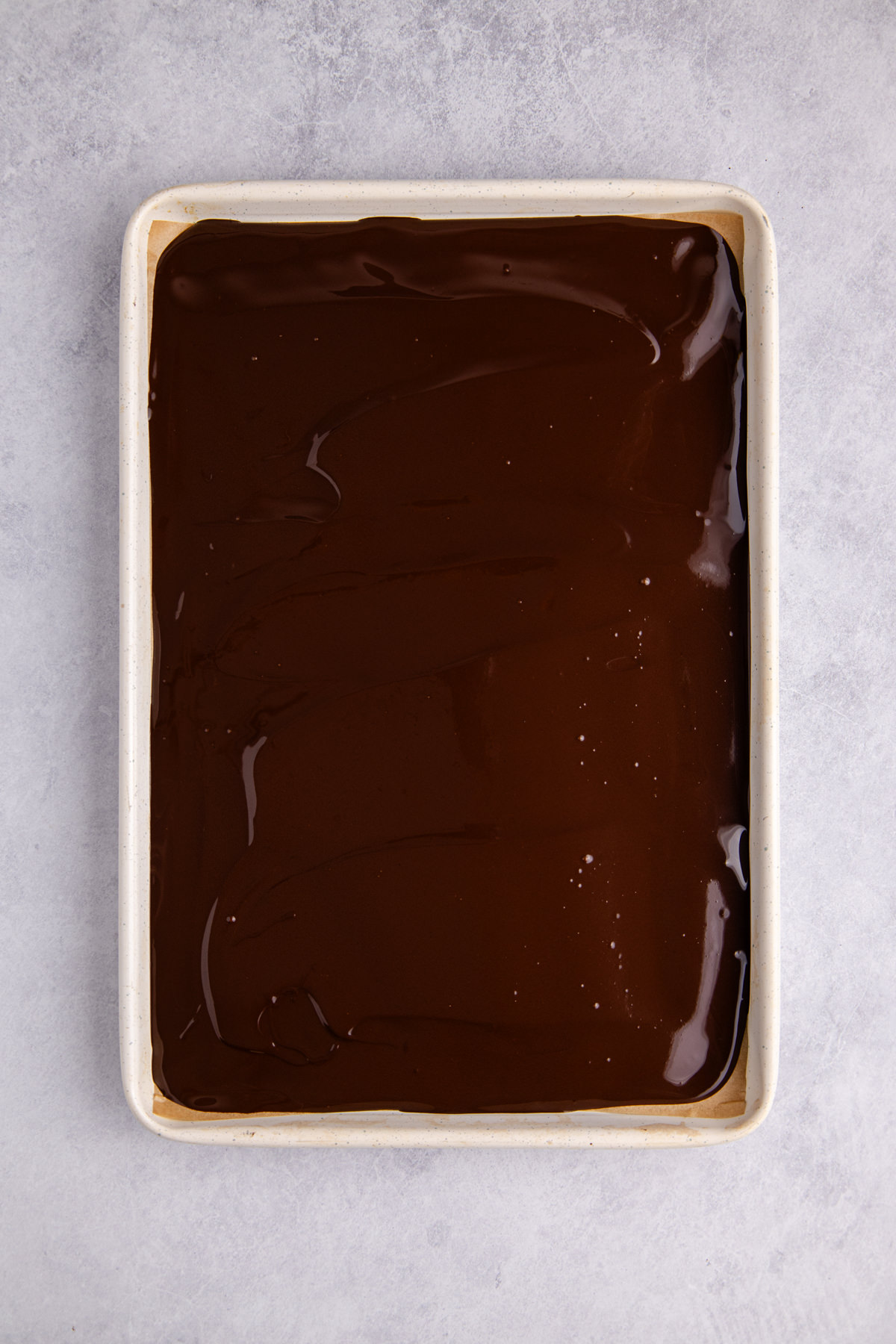 Melted chocolate poured onto the prepared pan.