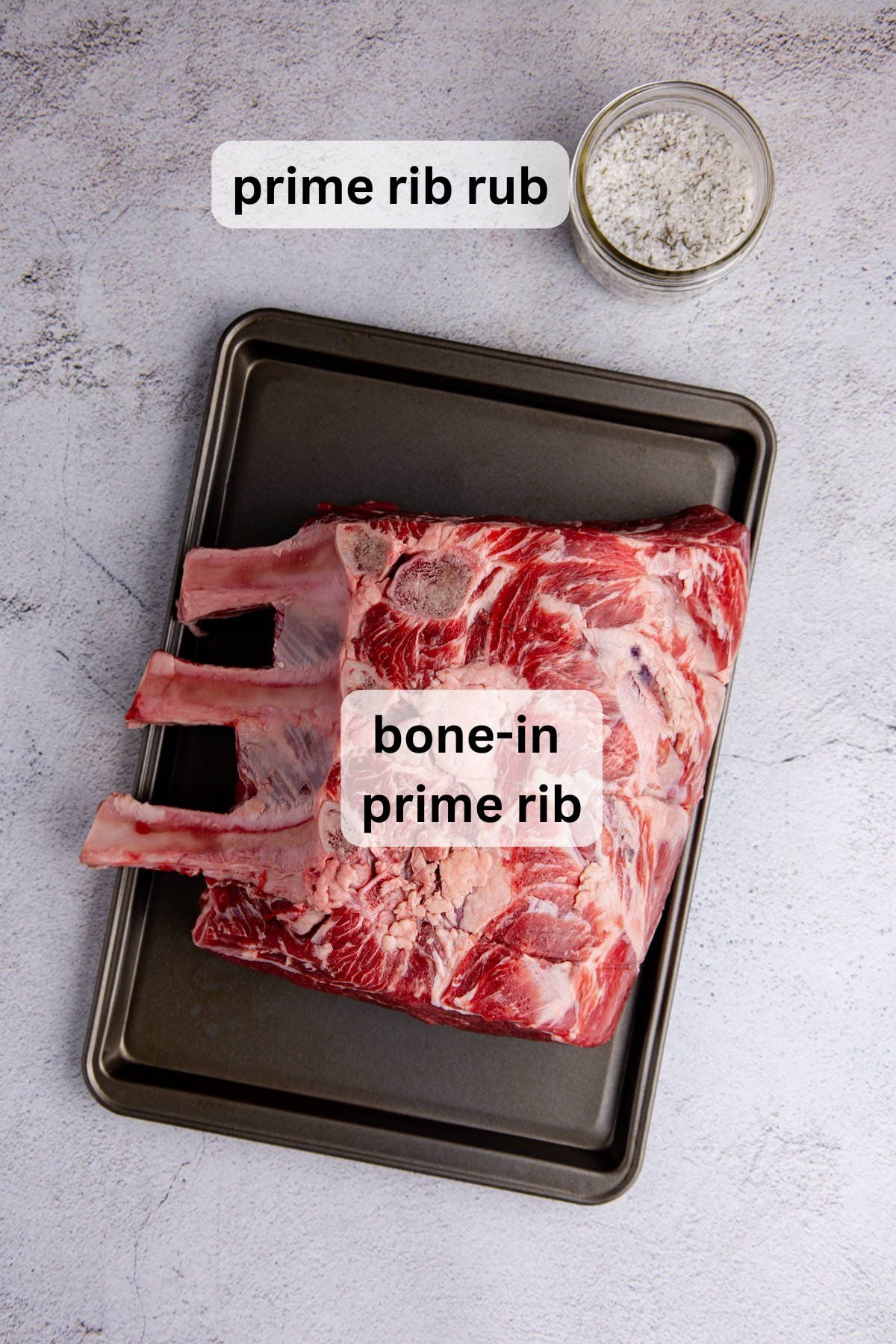 Ingredients to make this prime rib on a table.