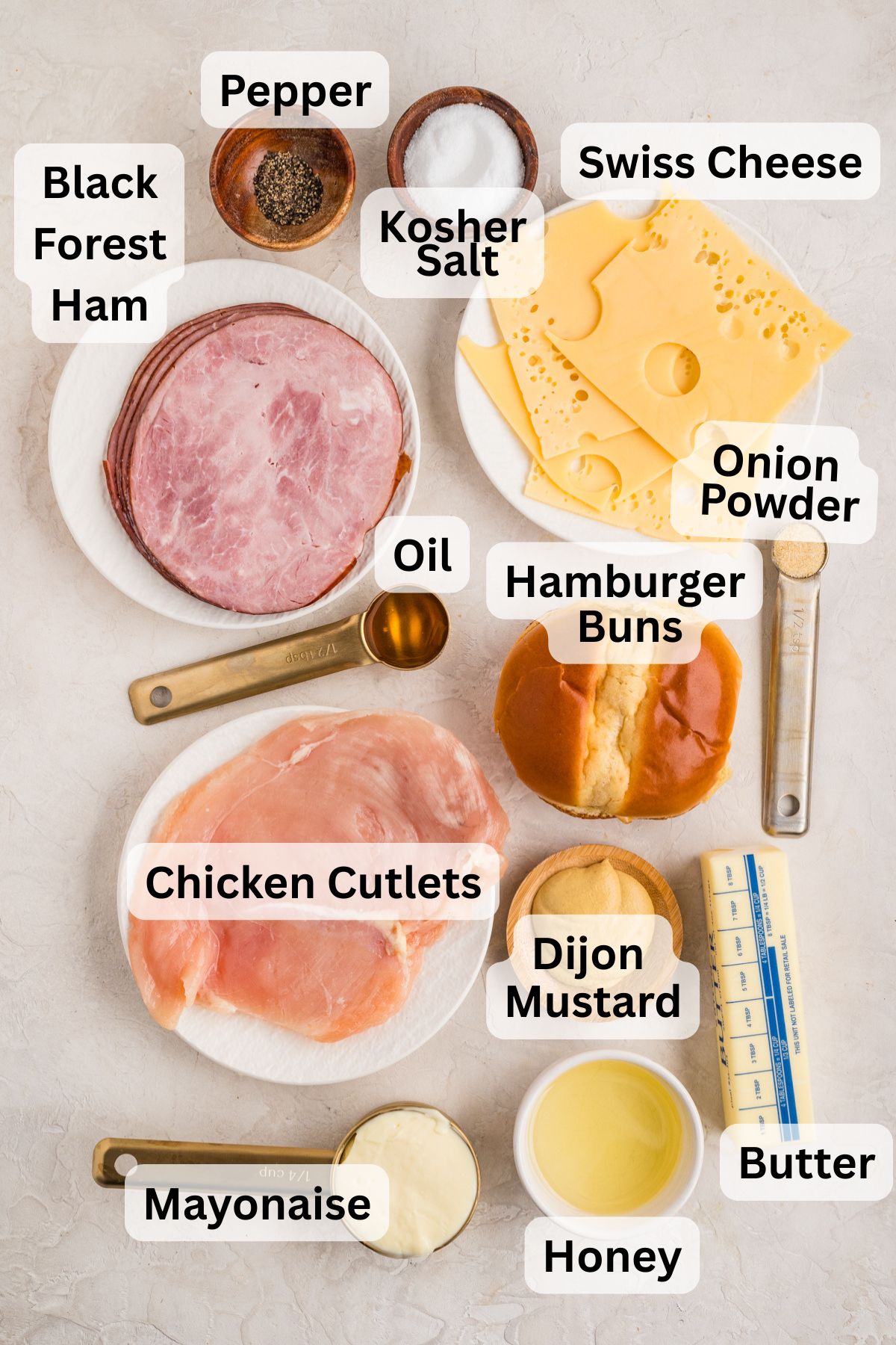 Ingredients to make this chicken cordon bleu sandwich on a table.
