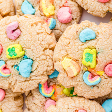 Lucky charms cookies stacked on top of one another.