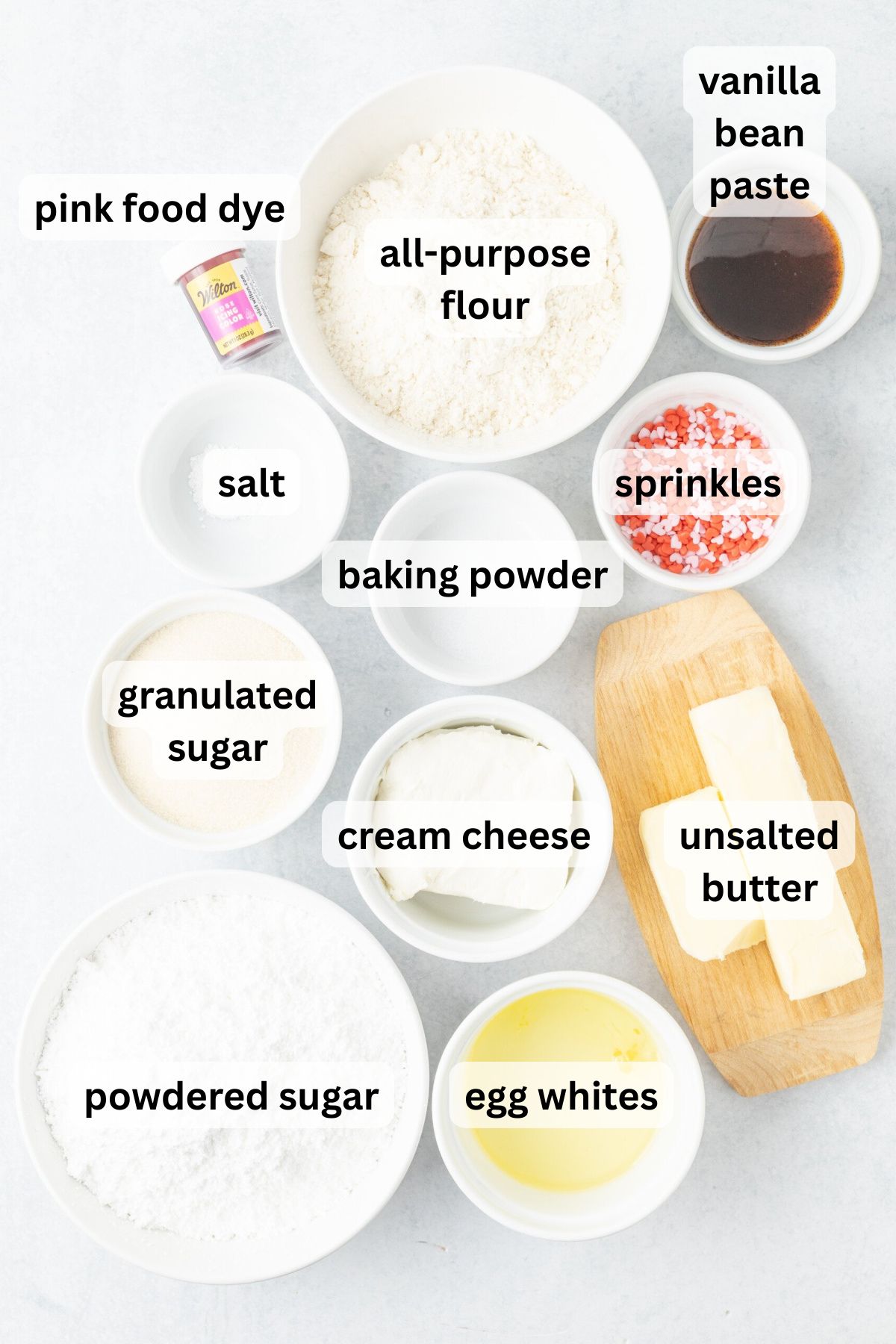 Ingredients to make these brownies in bowls on a table.