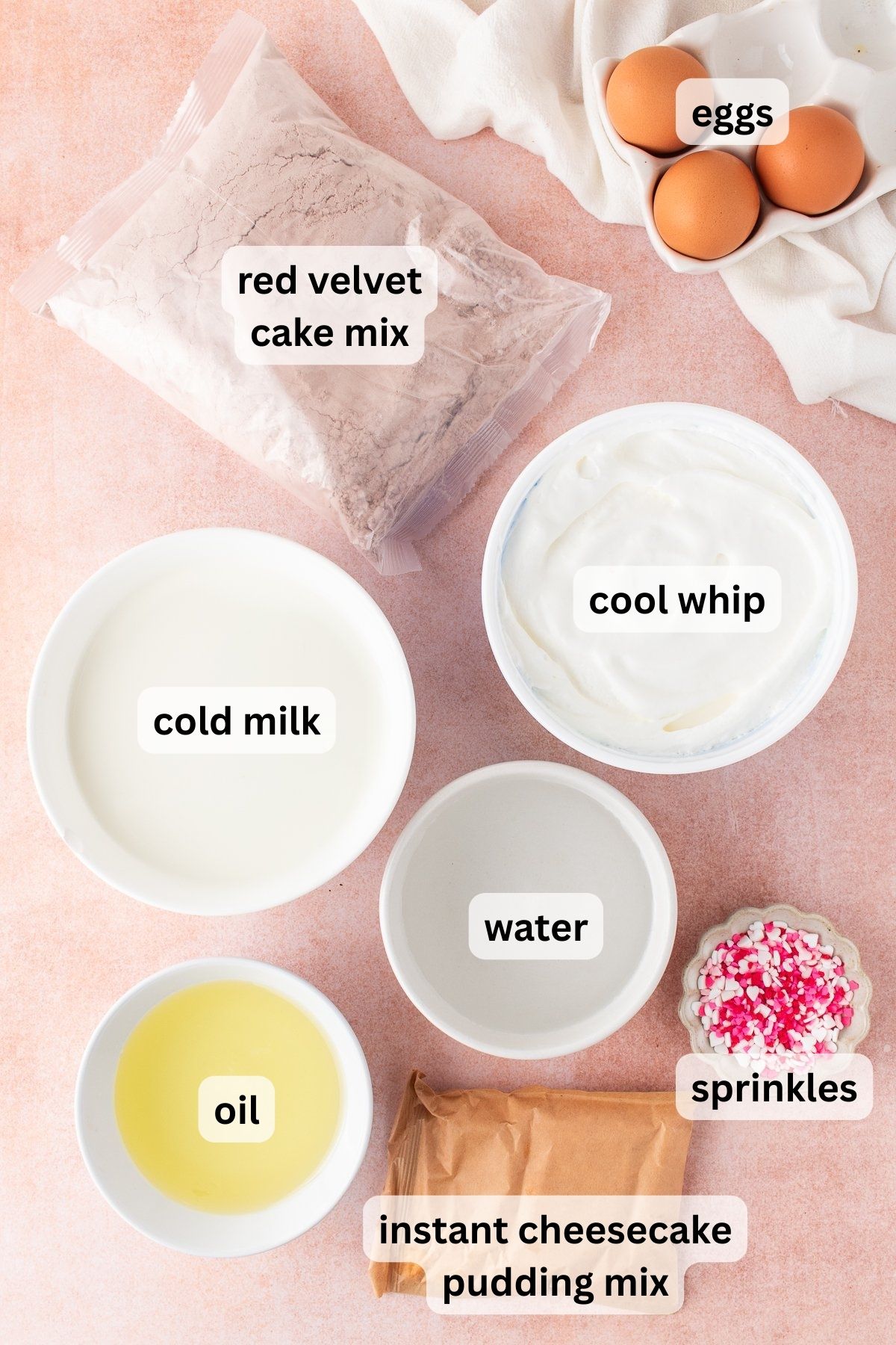 Ingredients to make this cake in bowls on a table.